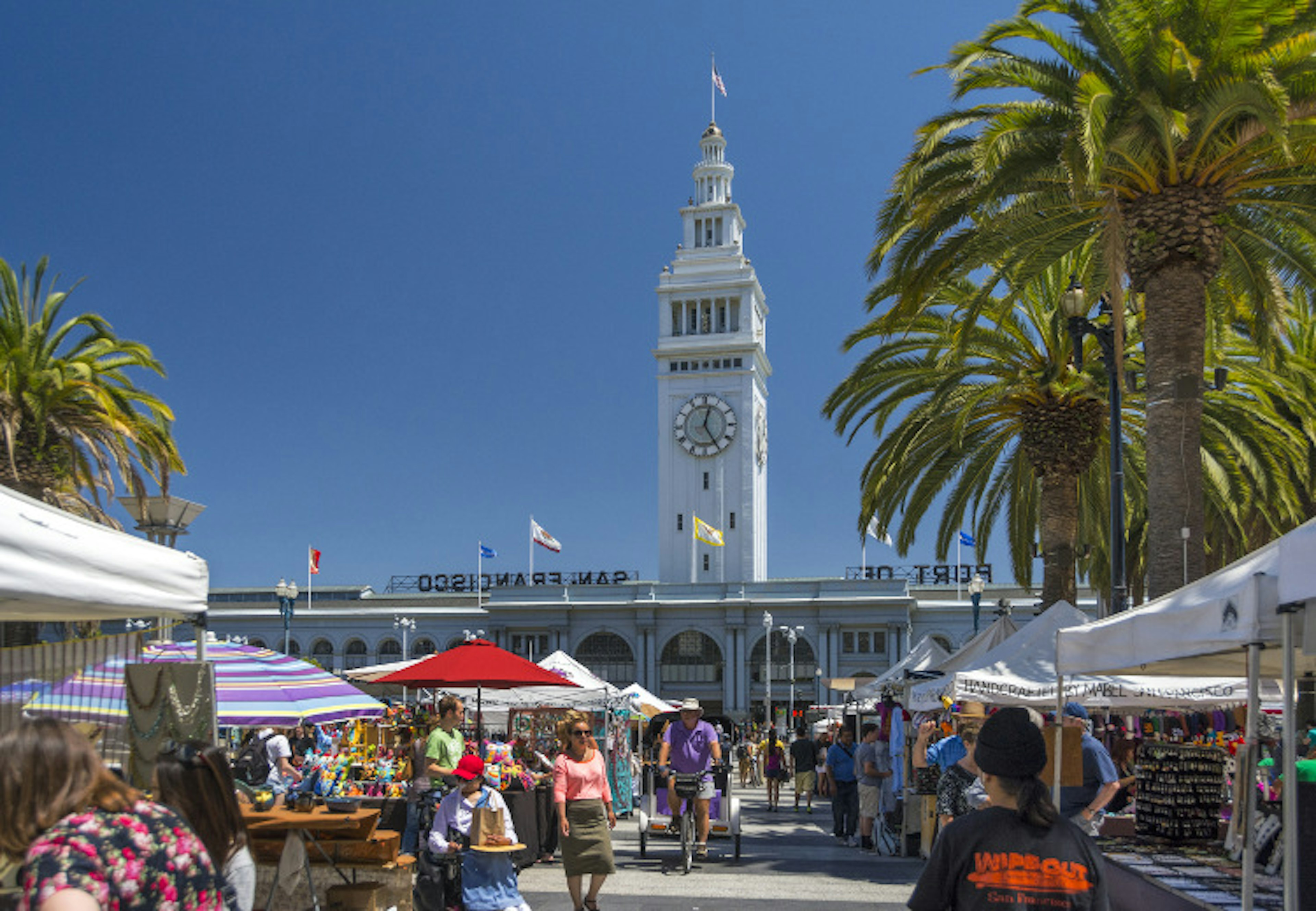 Treat yourself at the Ferry Building farmers market. Image by Izzet Keribar / Lonely Planet Images / Getty