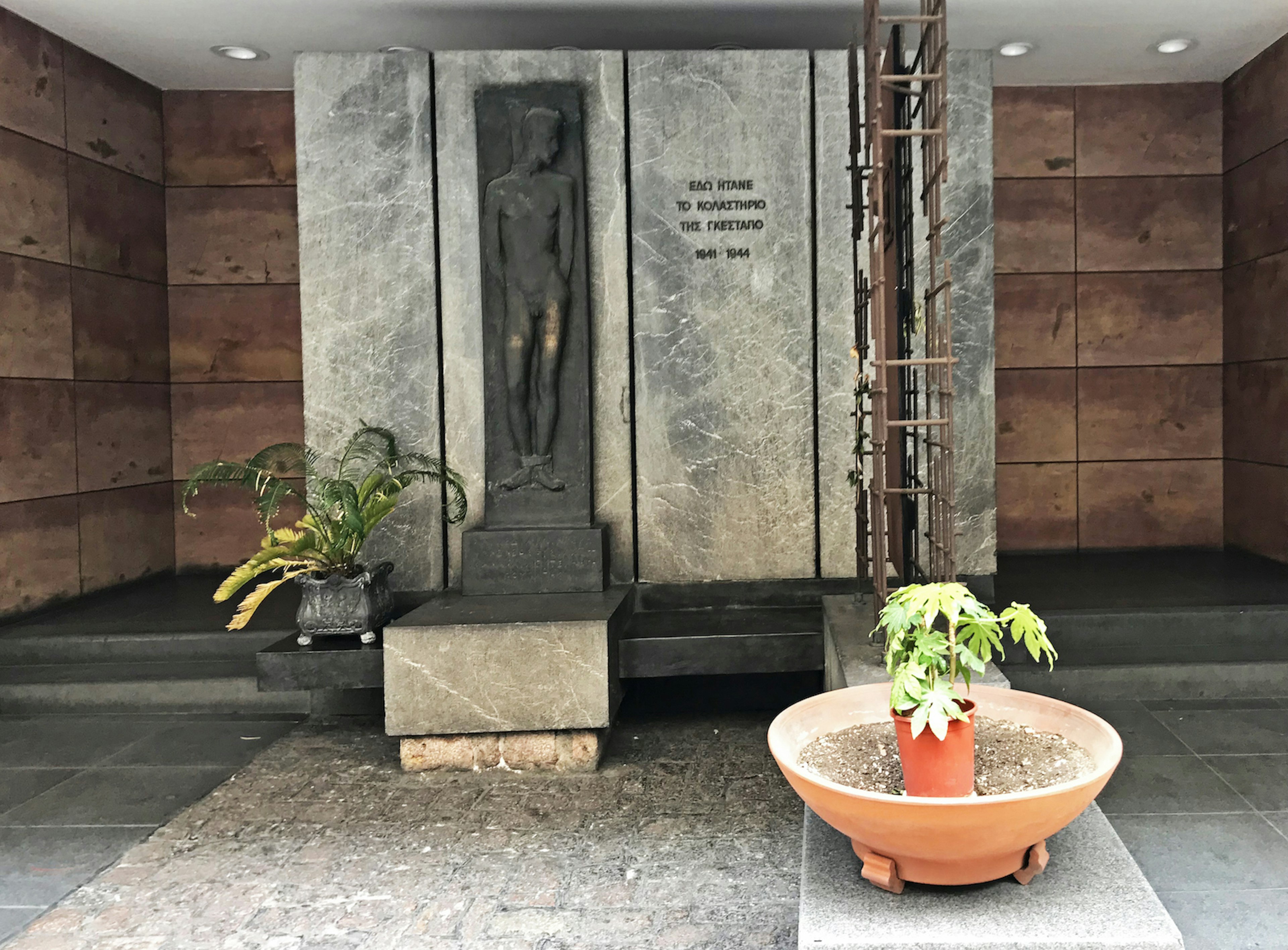 A sculpture of a nude man in the former Gestapo headquarters