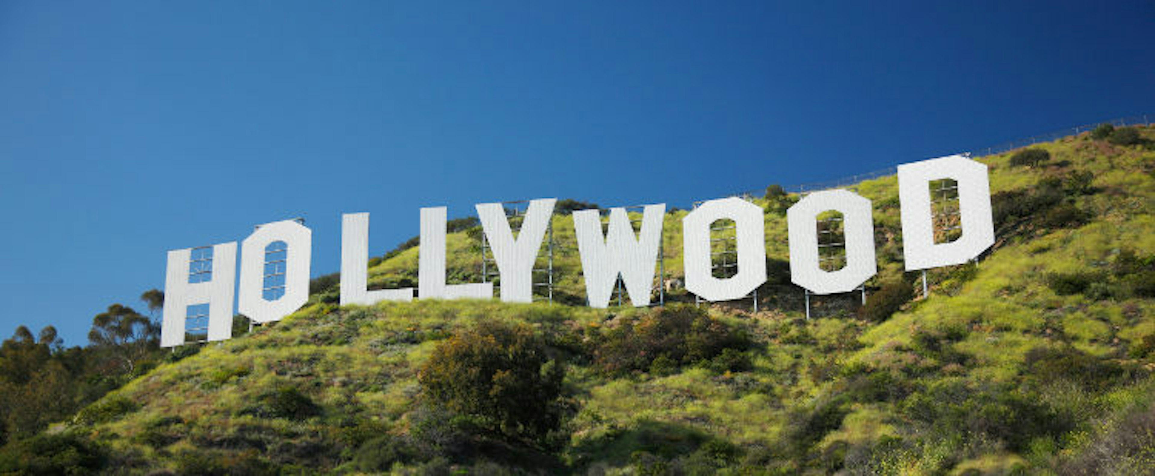 The Hollywood sign has been a symbol of the city since the 1920s. Image by Tim Hawley / Getty