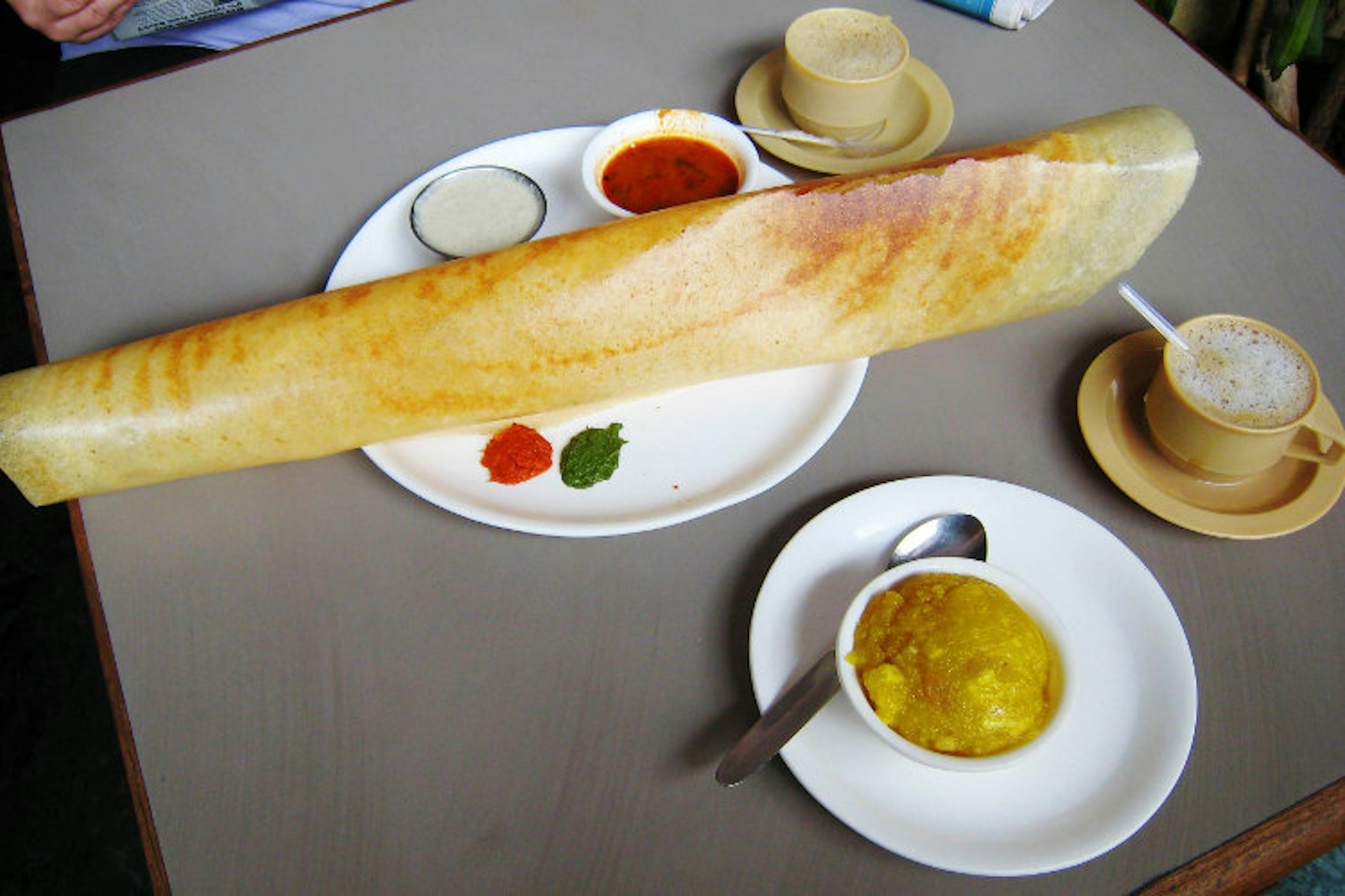 Supersized paper dosa and chai. Image by Charles Haynes / CC BY-SA 2.0.