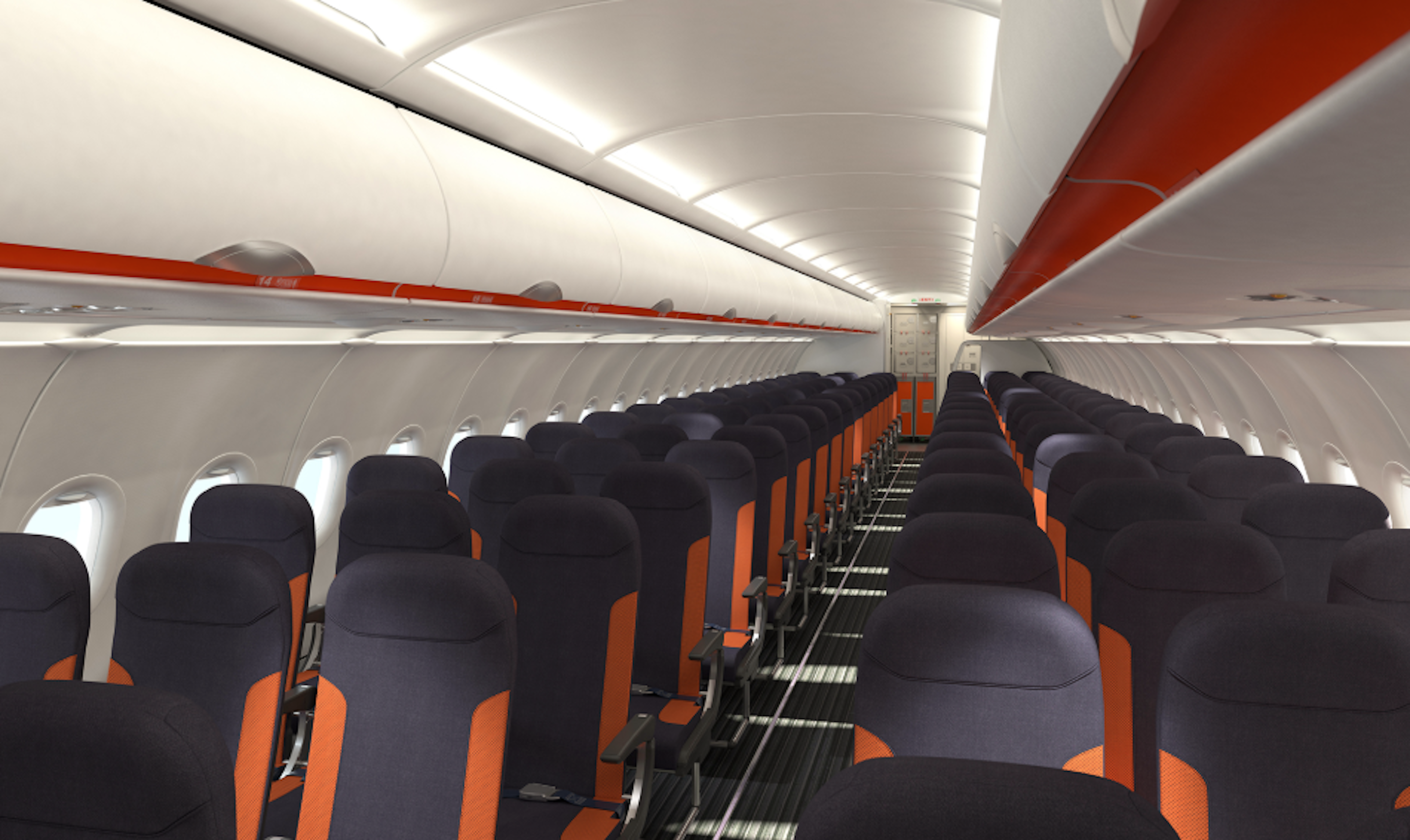 The front of an A320 EasyJet 1920. There are chairs in rows of three, with an isle in the middle. The chairs are black with an orange stripe.