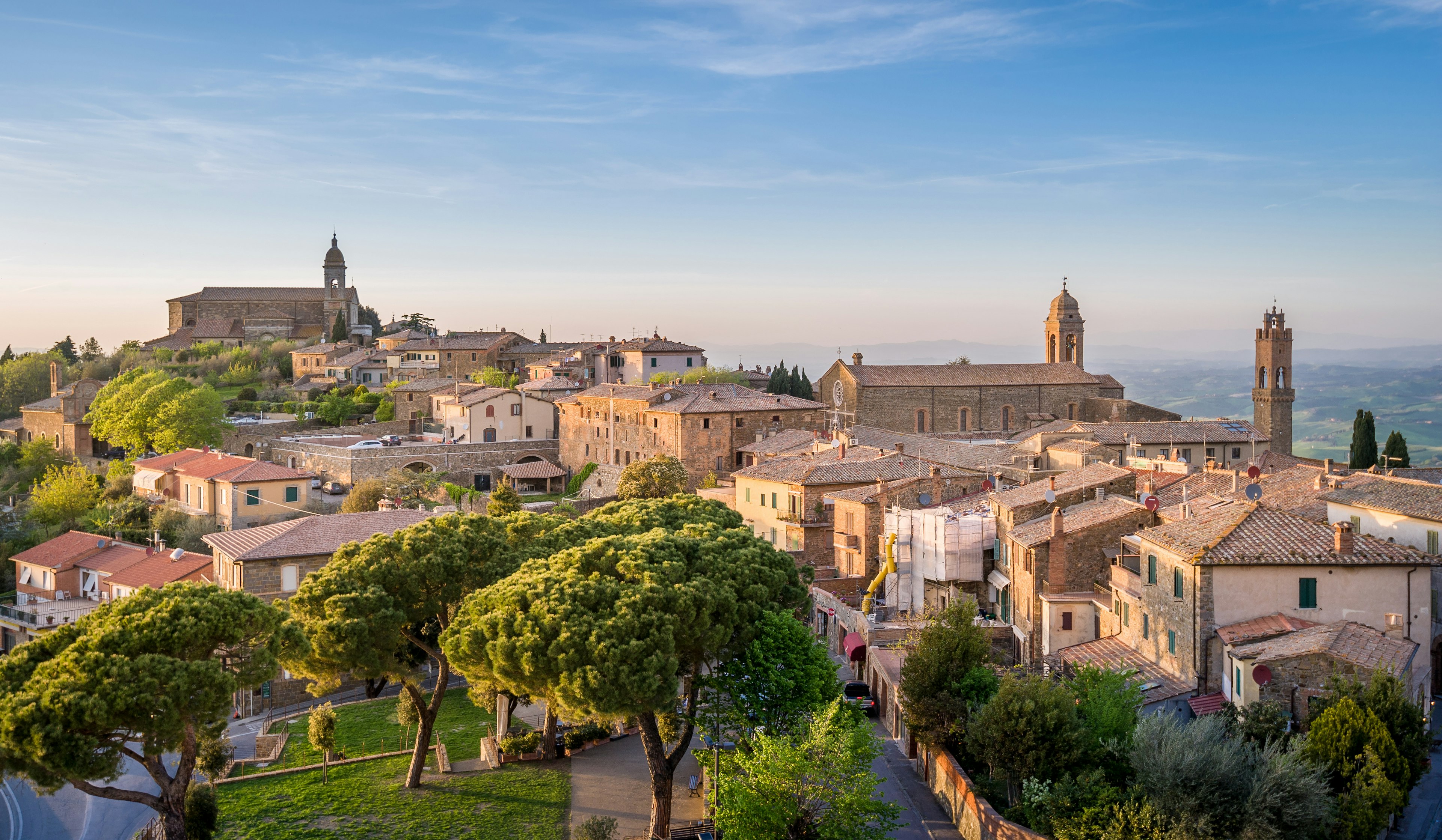 The fairytale town Montalcino is picture-perfect at golden hour. Adobe Stock.