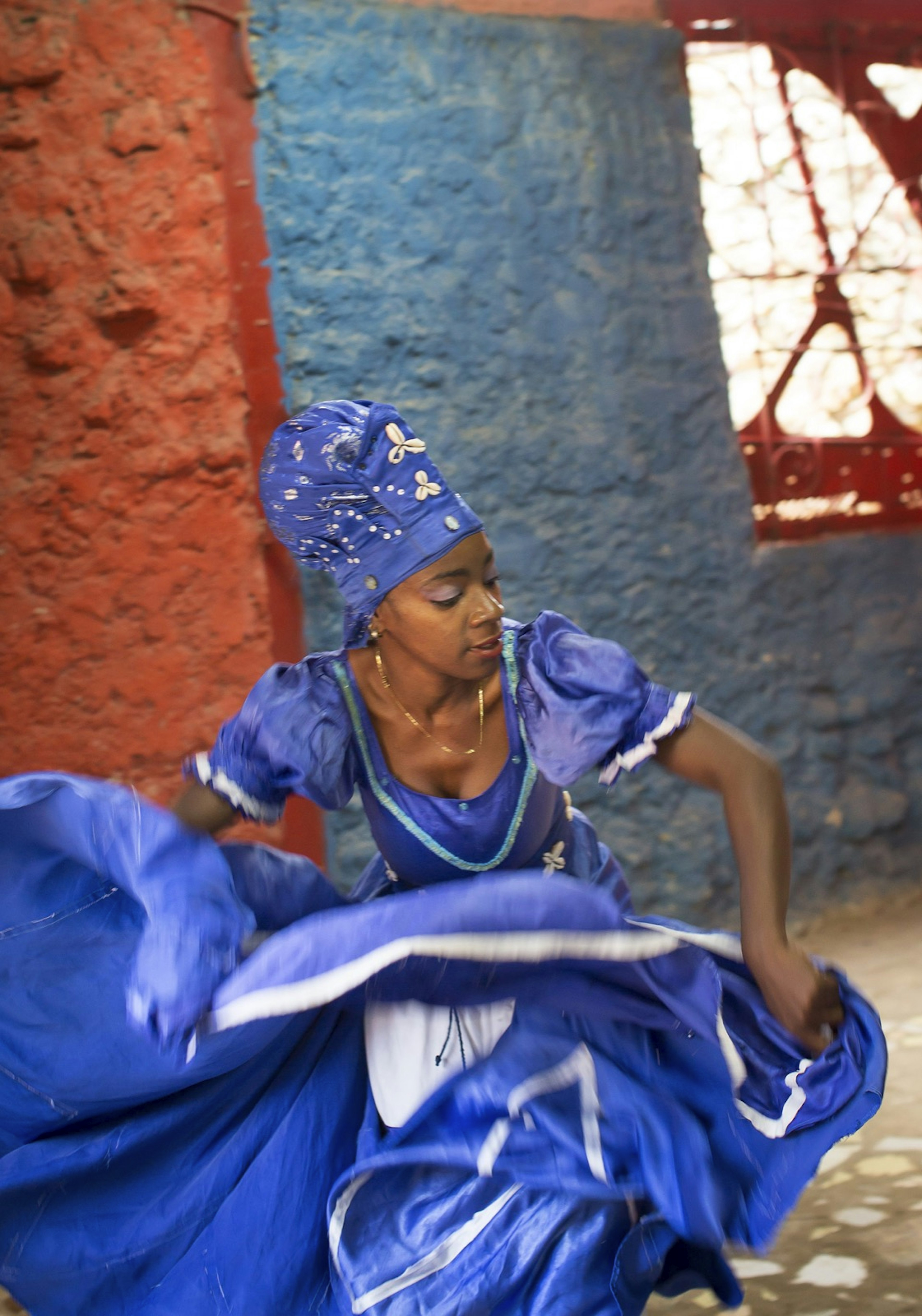 Thairumy Rangel Chirino dances as the goddess Yemay Philip Lee Harvey / Lonely Planet