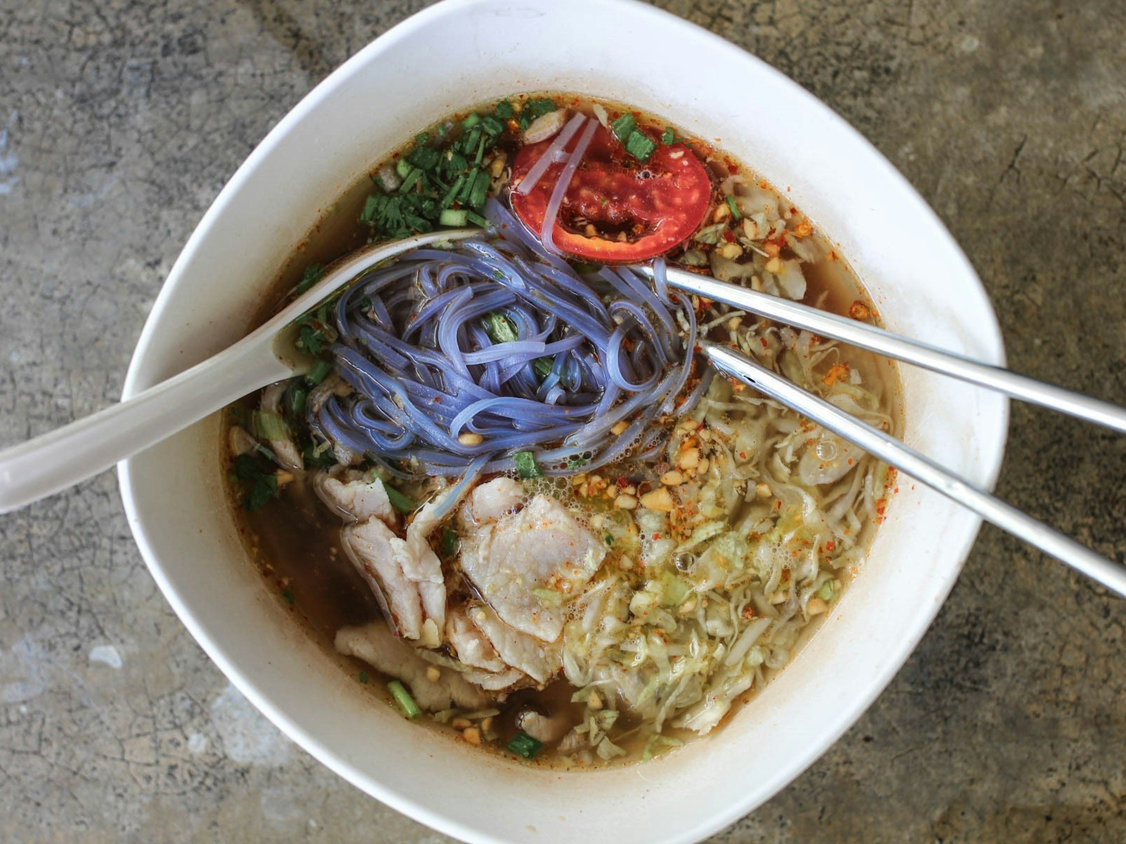 A bowl of blue-hued rice noodles at Anchan Noodle cafe in Nimmanhaemin neighbourhood