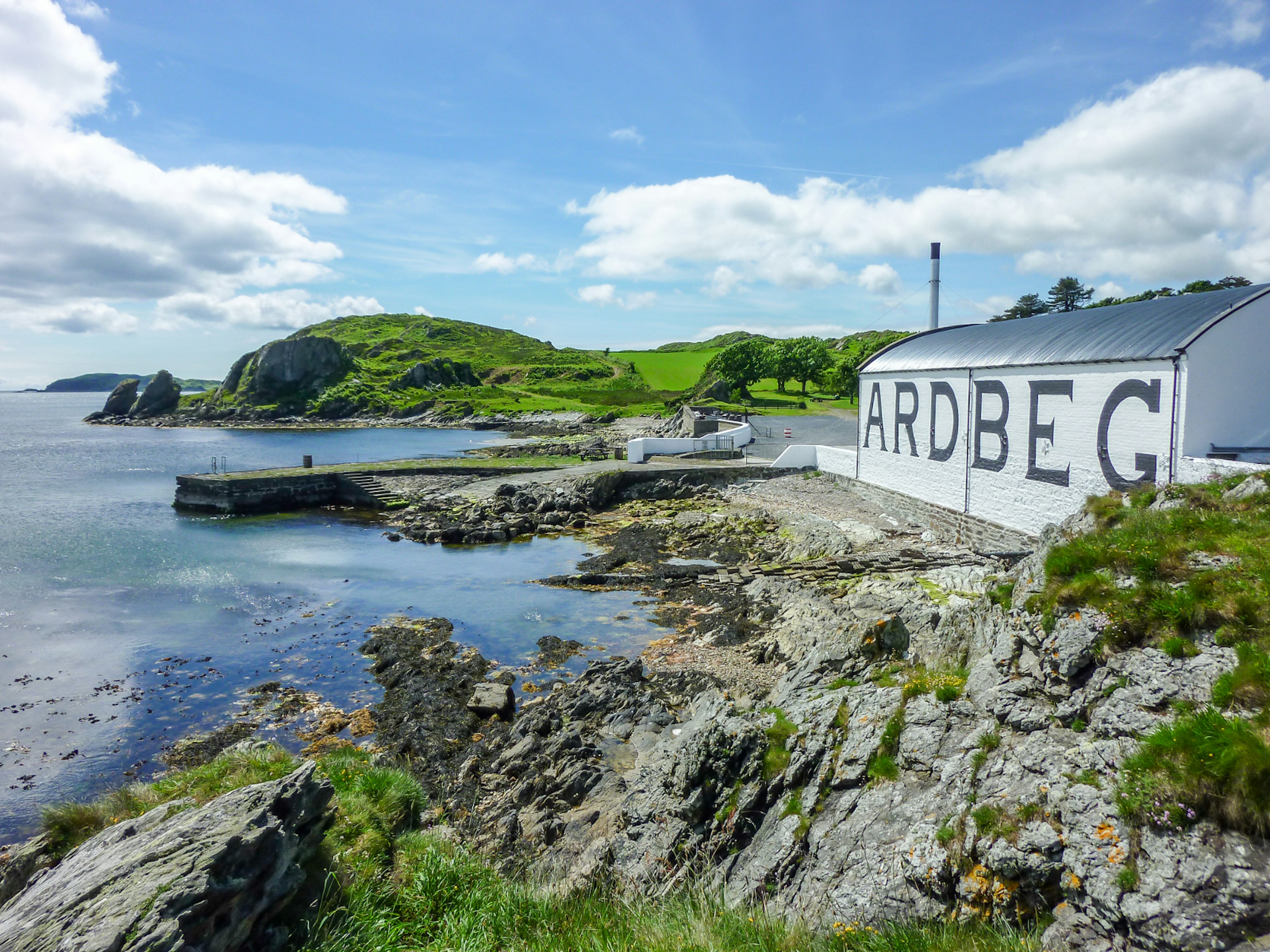 The Ardbeg distillery looking over the rugged coastline