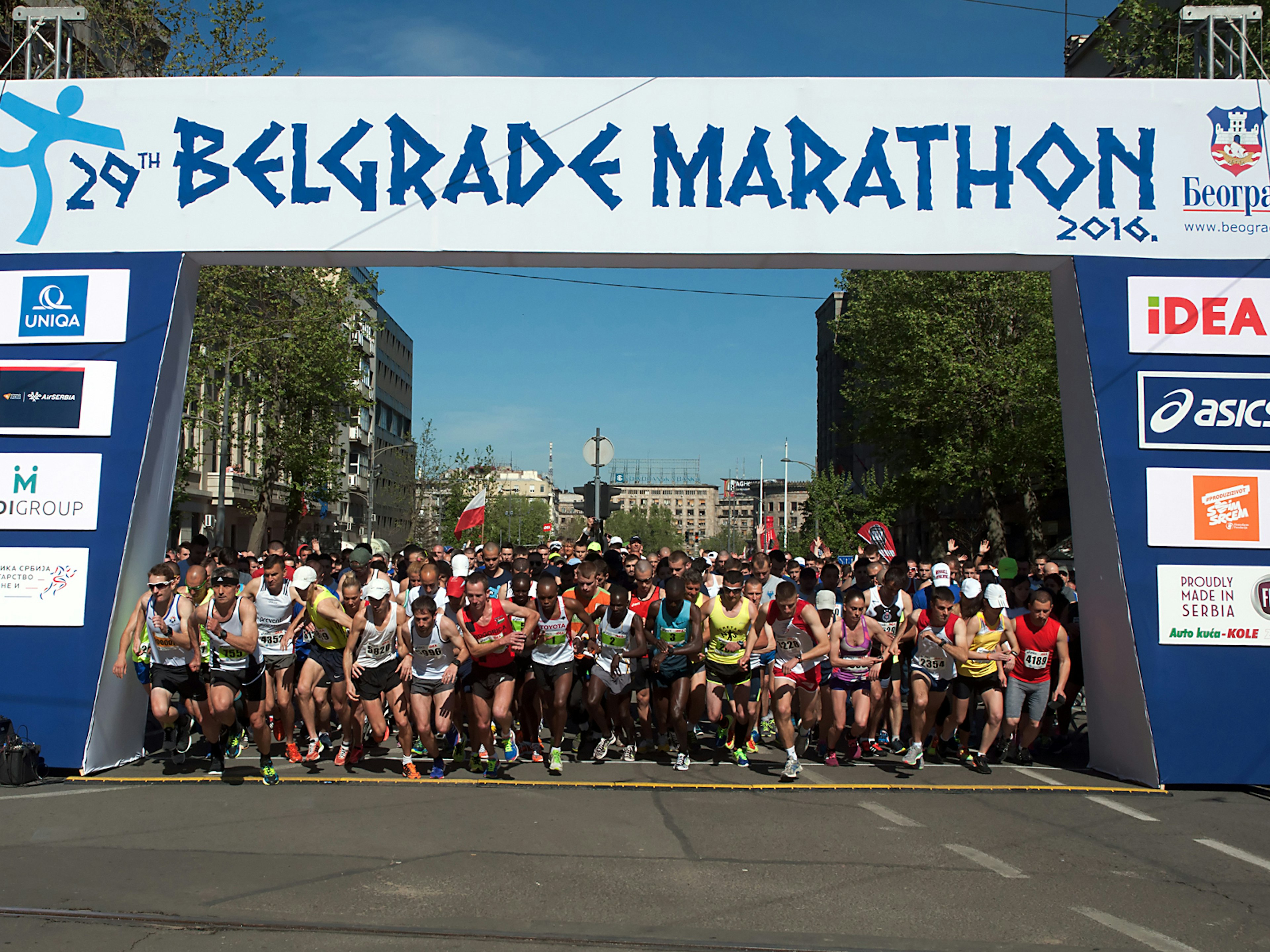 Runners at the starting line under the banner of the 29th Belgrade Marathon