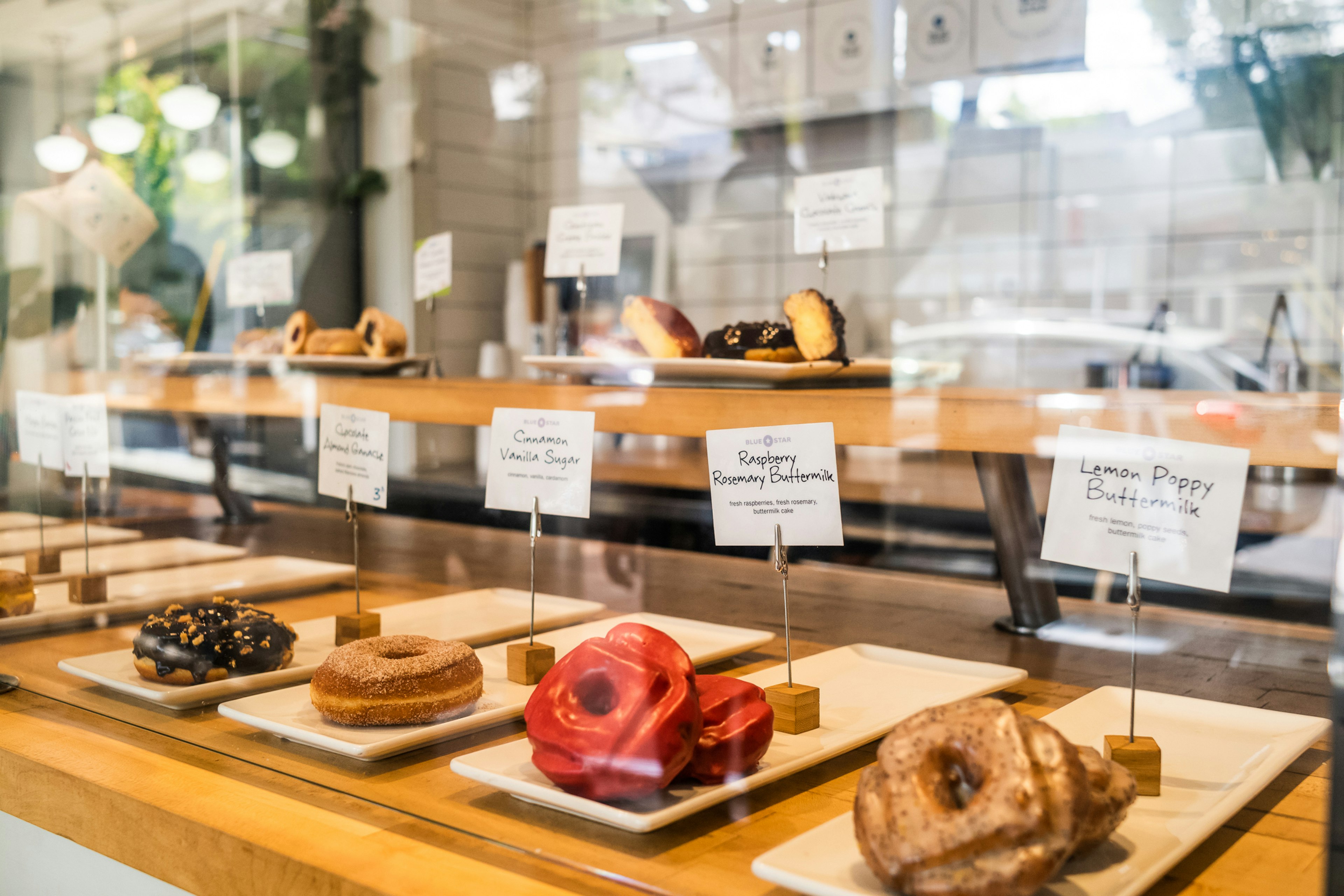 Donuts are a Portland tradition, served glazed, unglazed and topped at shops such as Blue Star Donuts. Justin Katigbak, via Travel Portland