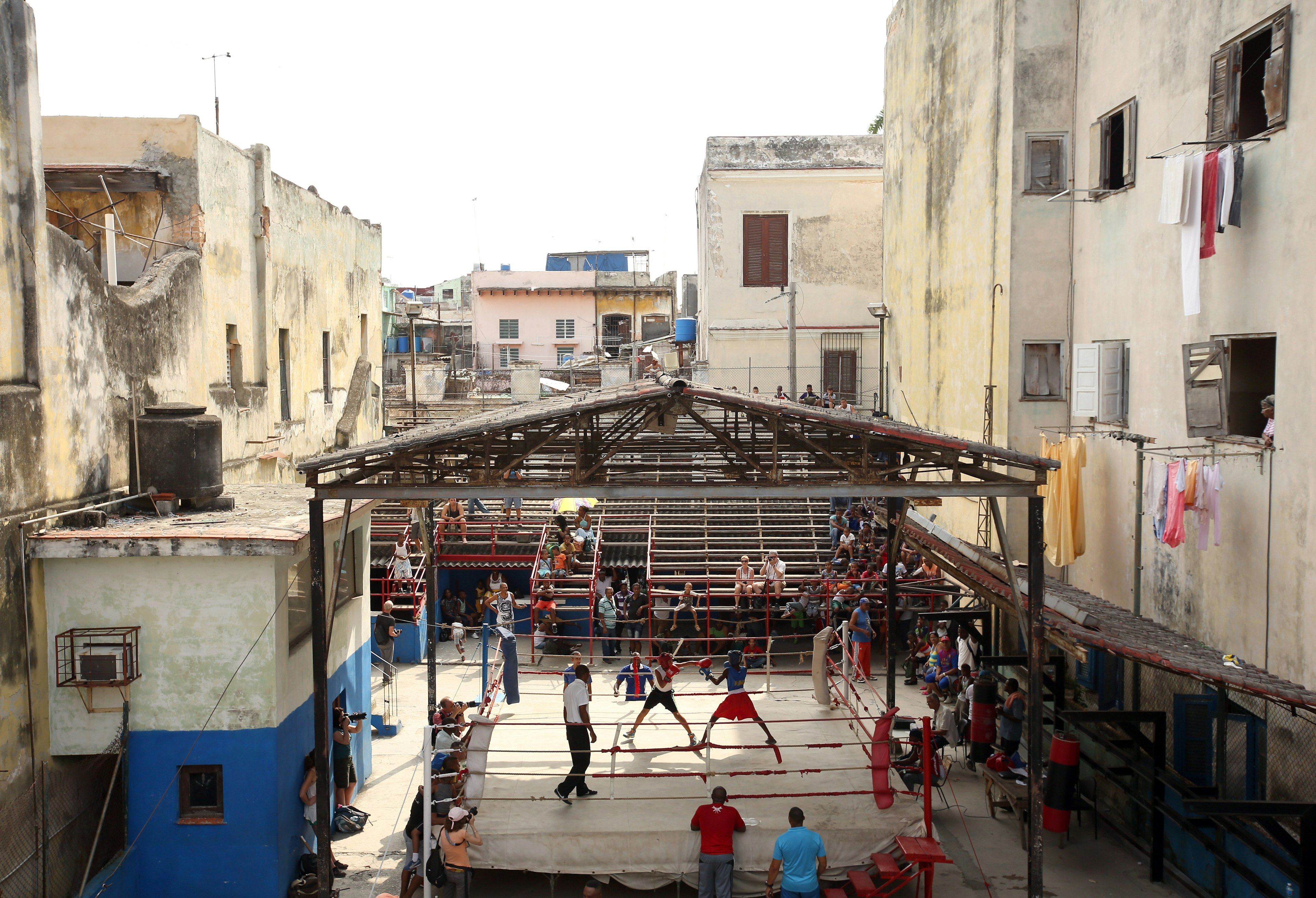 A general view of a fight at Rafael Trejo Gym in Havana, Cuba. The Rafael Trejo Boxing Gym is probably the most famous gym in Havana. Kids from all over the city work out there with great trainers, some of whom are former Olympic champions. The gym also hosts competitions for different age groups throughout the month. Ezra Shaw/Getty Images)