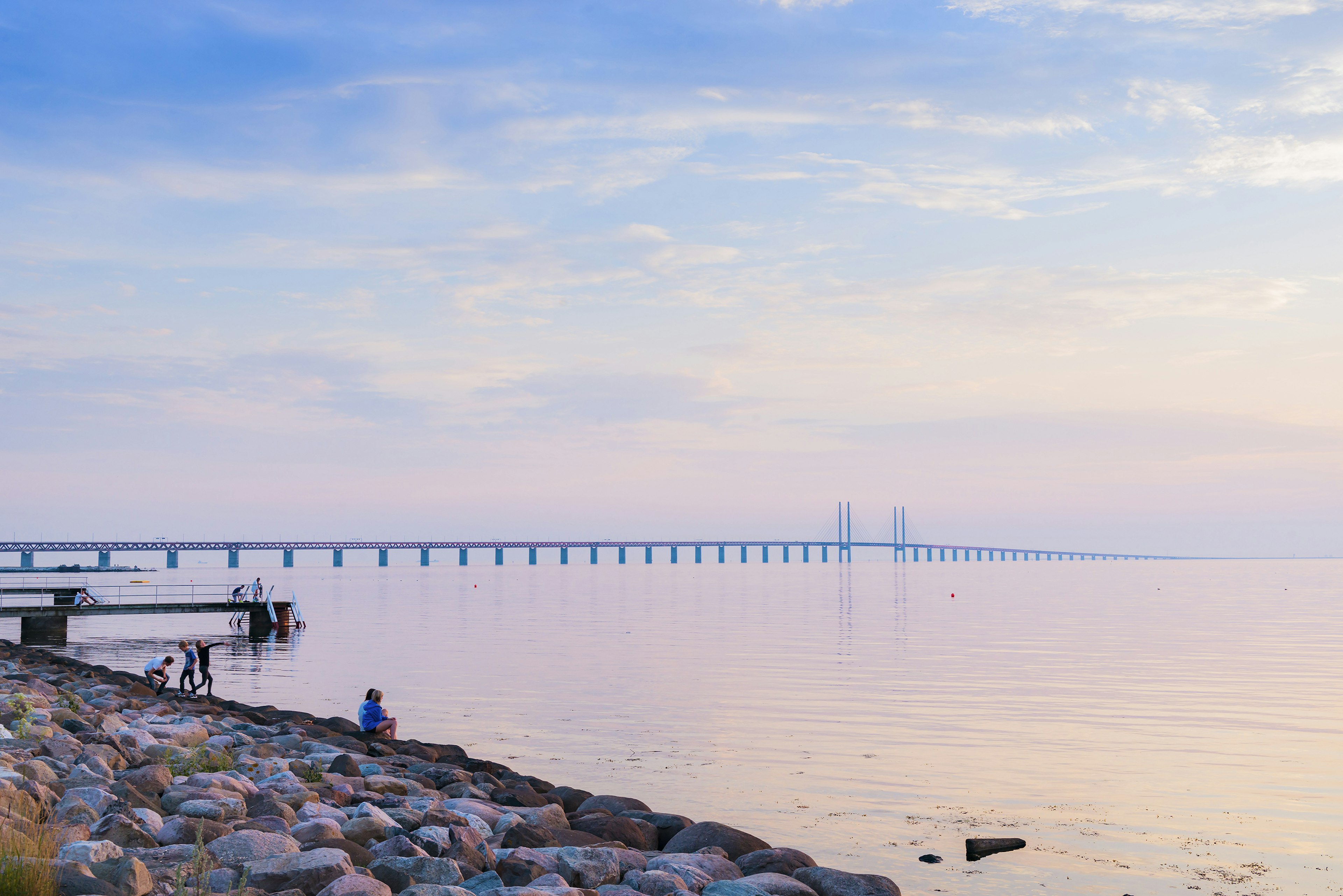 Folio Images.+46 8 720 56 00.info@folio.se
722246075
"Horizontal, Outdoors, Sunset, People In The Background, Cloud, Built Structure, Tranquil Scene, Sea, Coastline, Leisure, Sky, Sweden, Skane, Malmo, Sibbarp, Rock, Oresund Bridge, Rippled, Swedish, Kingdom Of Sweden, Europe, Northern Europe, Scandinavia, European, Scandinavian, Outside, Dusk, Background People, Clouds, Man Made Structure, Tranquility, Oceans, Ocean, Saltwater, Sea Water, Seas, Recreation And Leisure, Recreation"