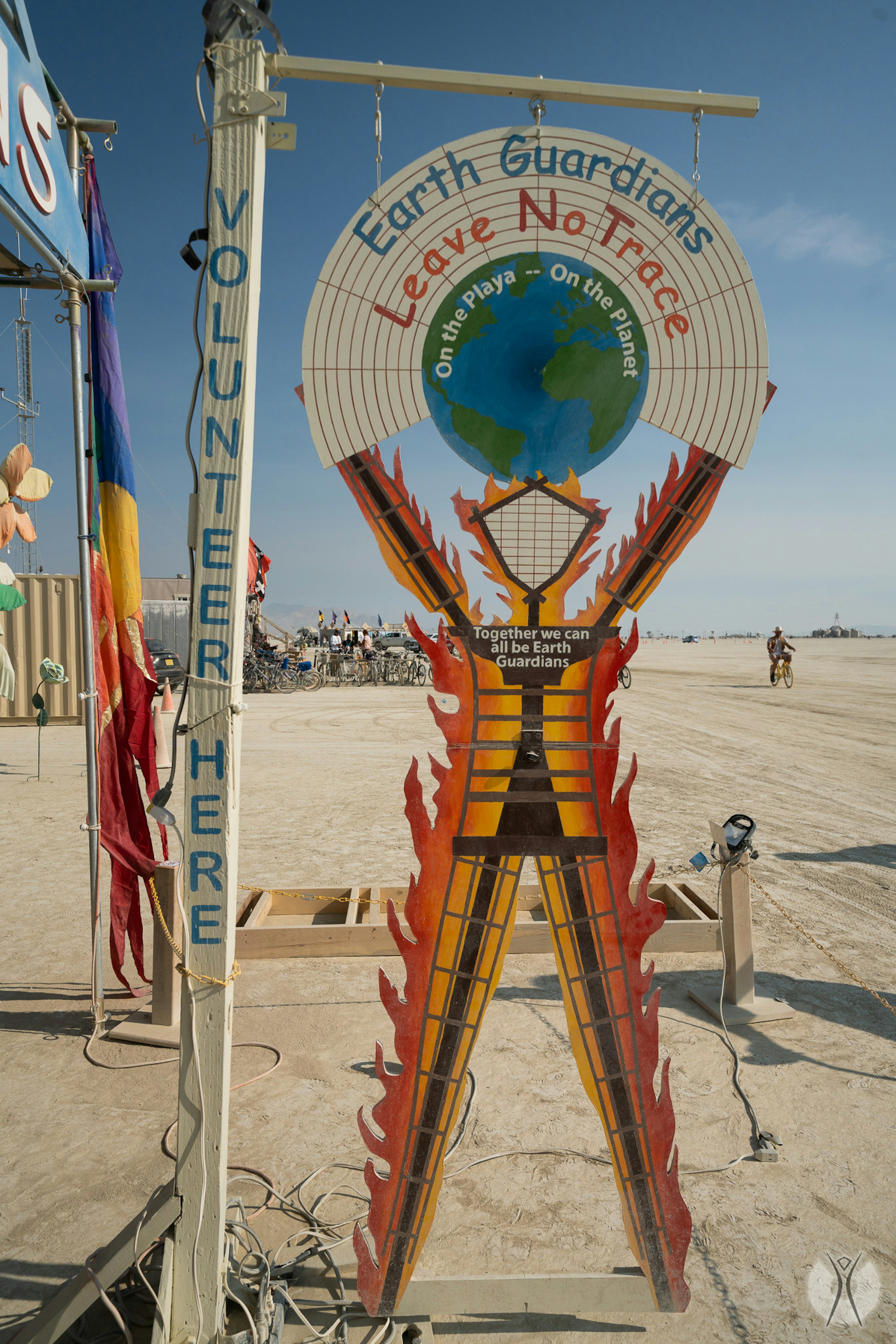 A sign for the Earth Guardians promotes sustainability at Burning Man.