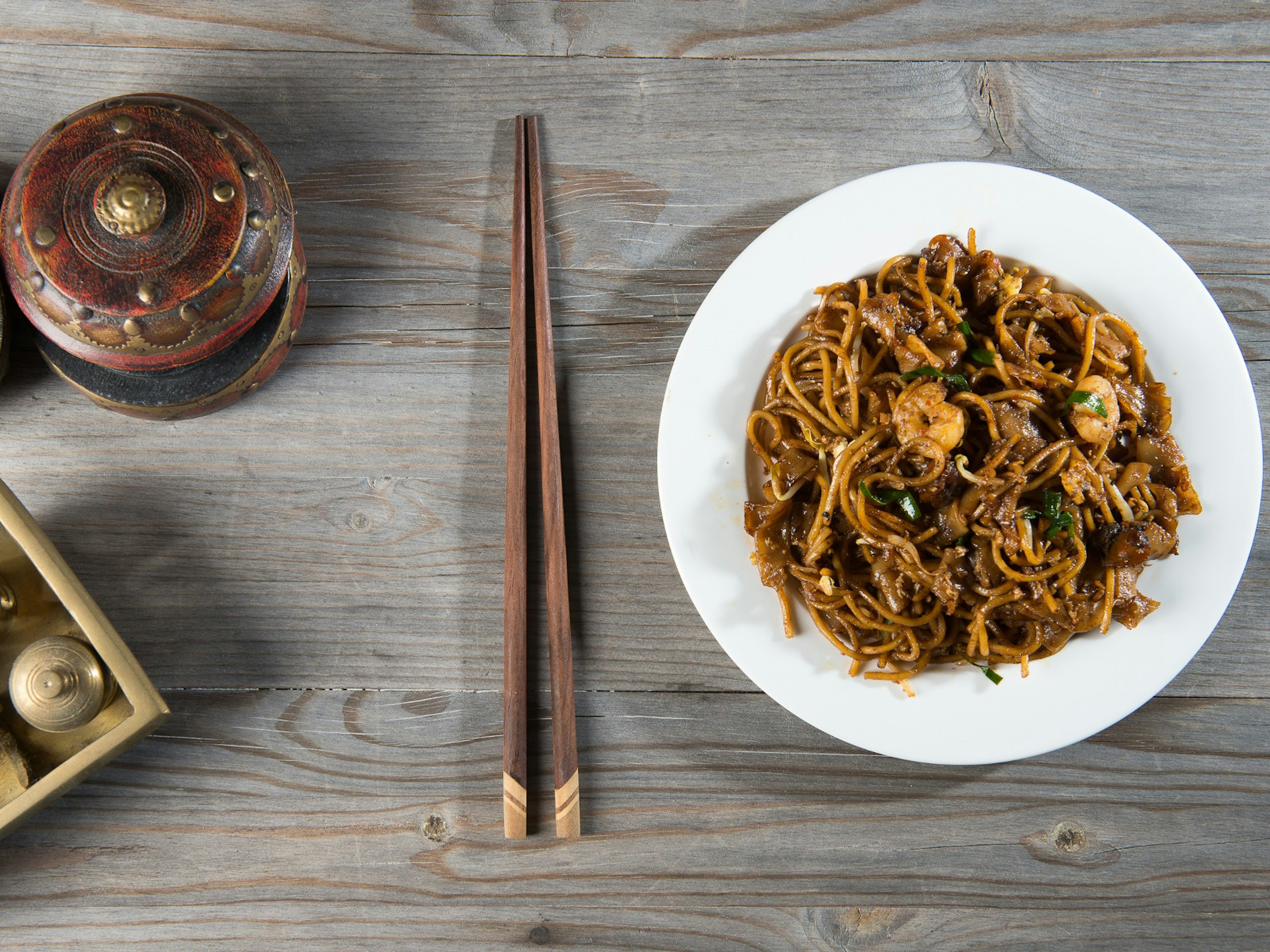 A dish of fried char kuey teow, or flat wide rice noodles