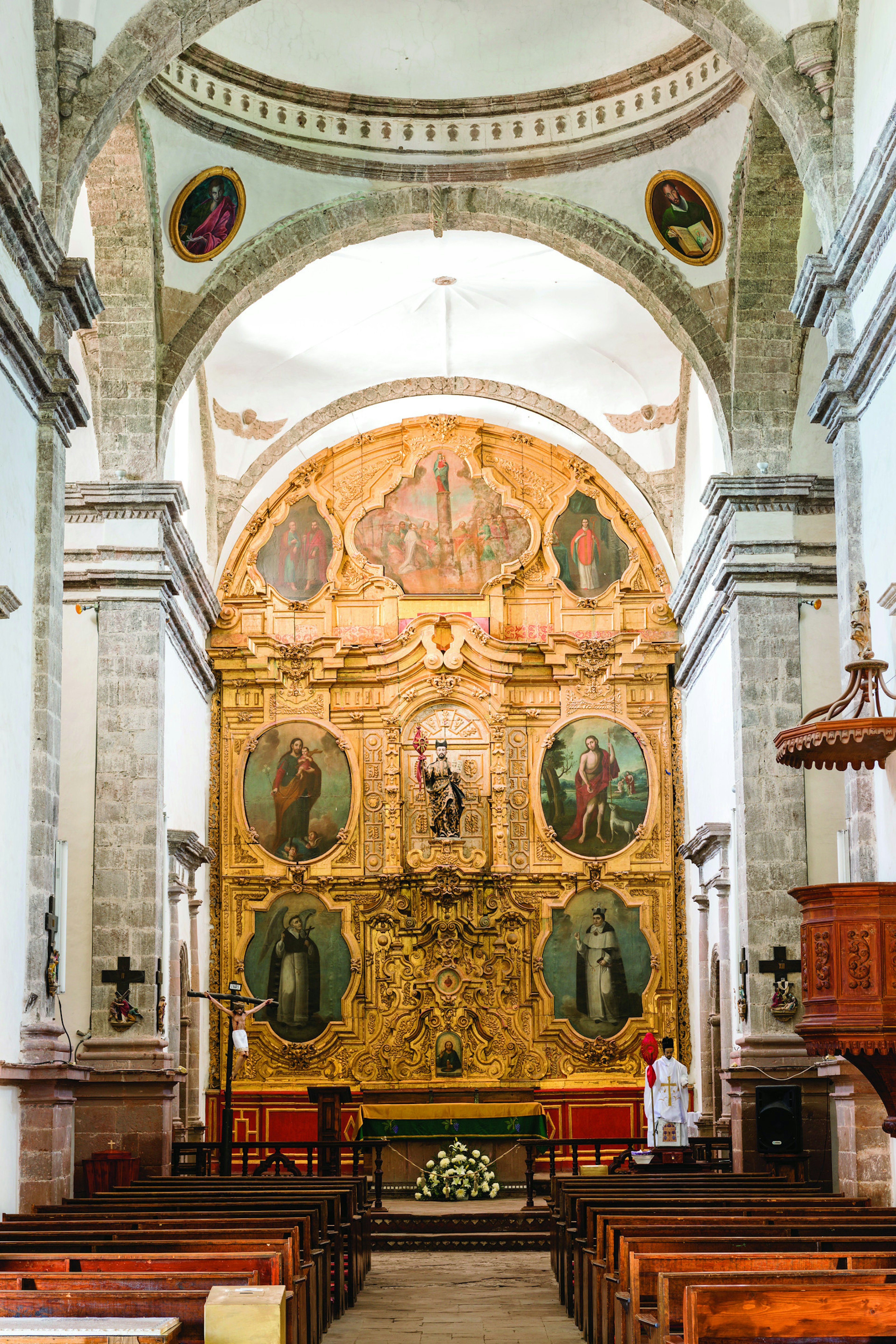 The Baroque retablo behind the altar in the Mision de San Ignacio