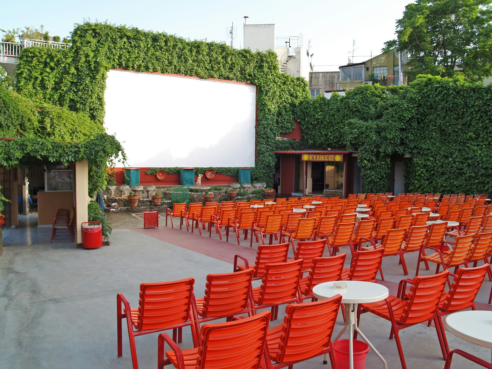 The movie screen and rows of seats at the open-air Cine Thisio in Athens