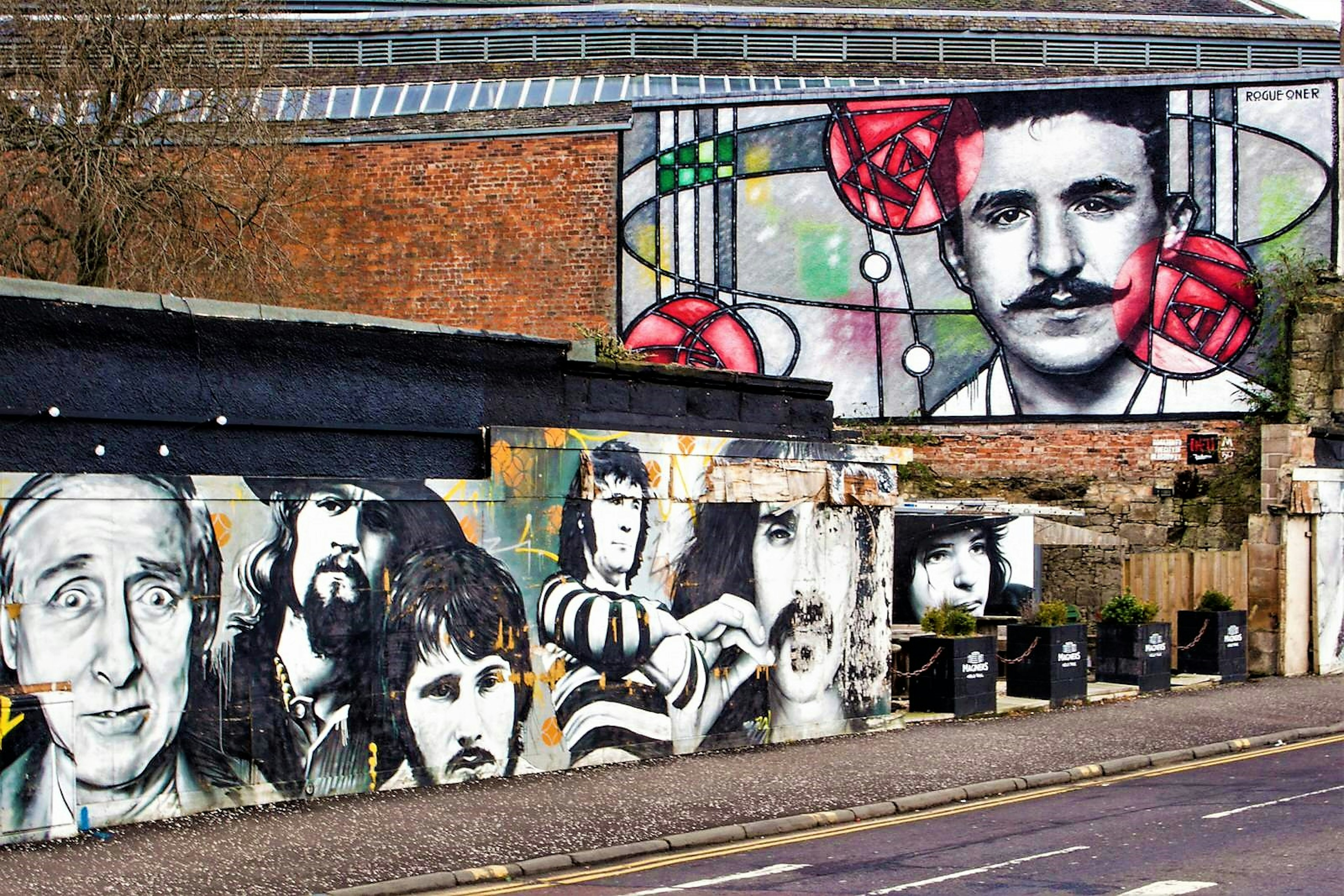 Artwork on the walls of the Clutha pub's beer garden