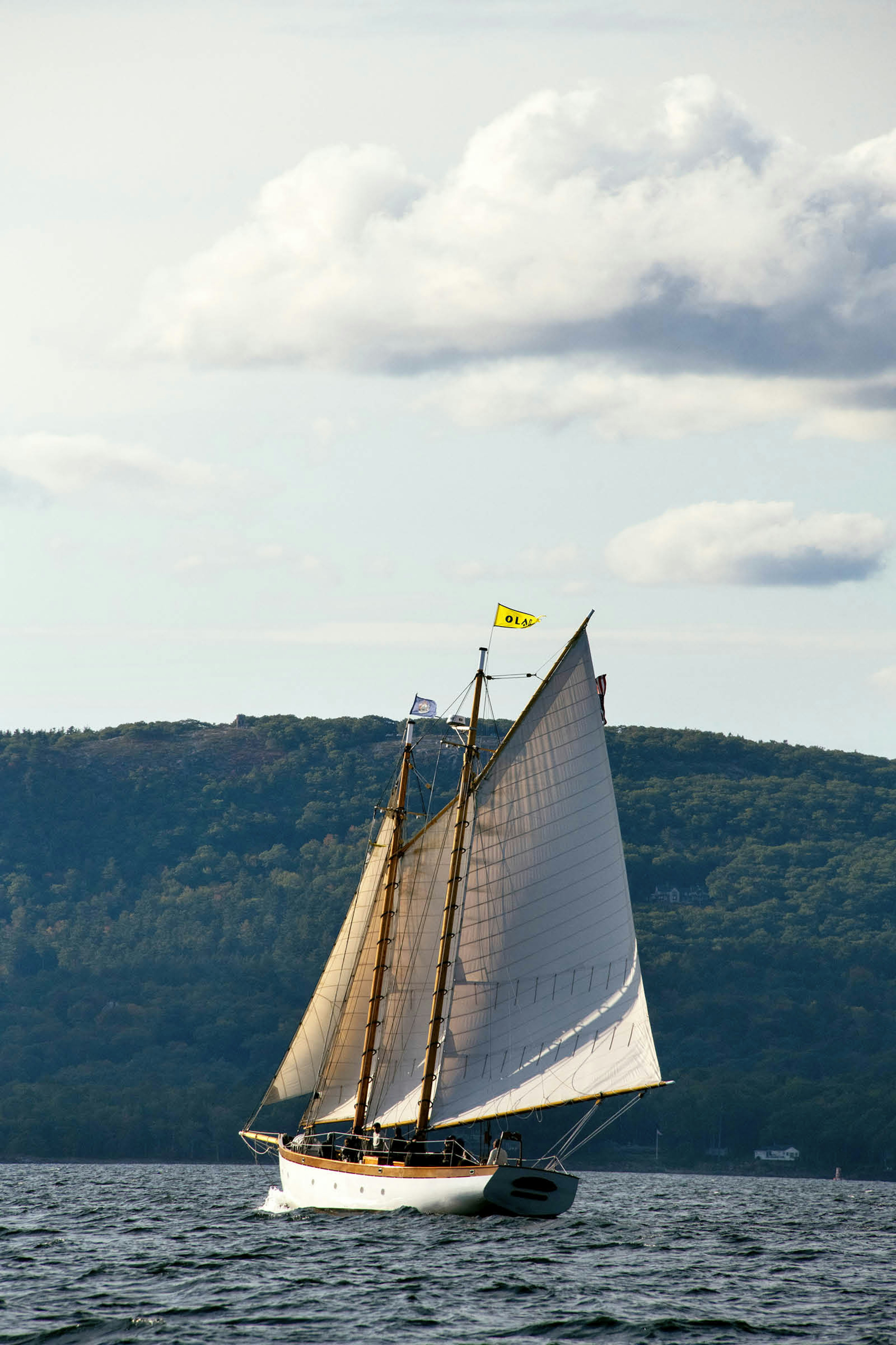 Sails up on a vintage schooner in Penobscot Bay