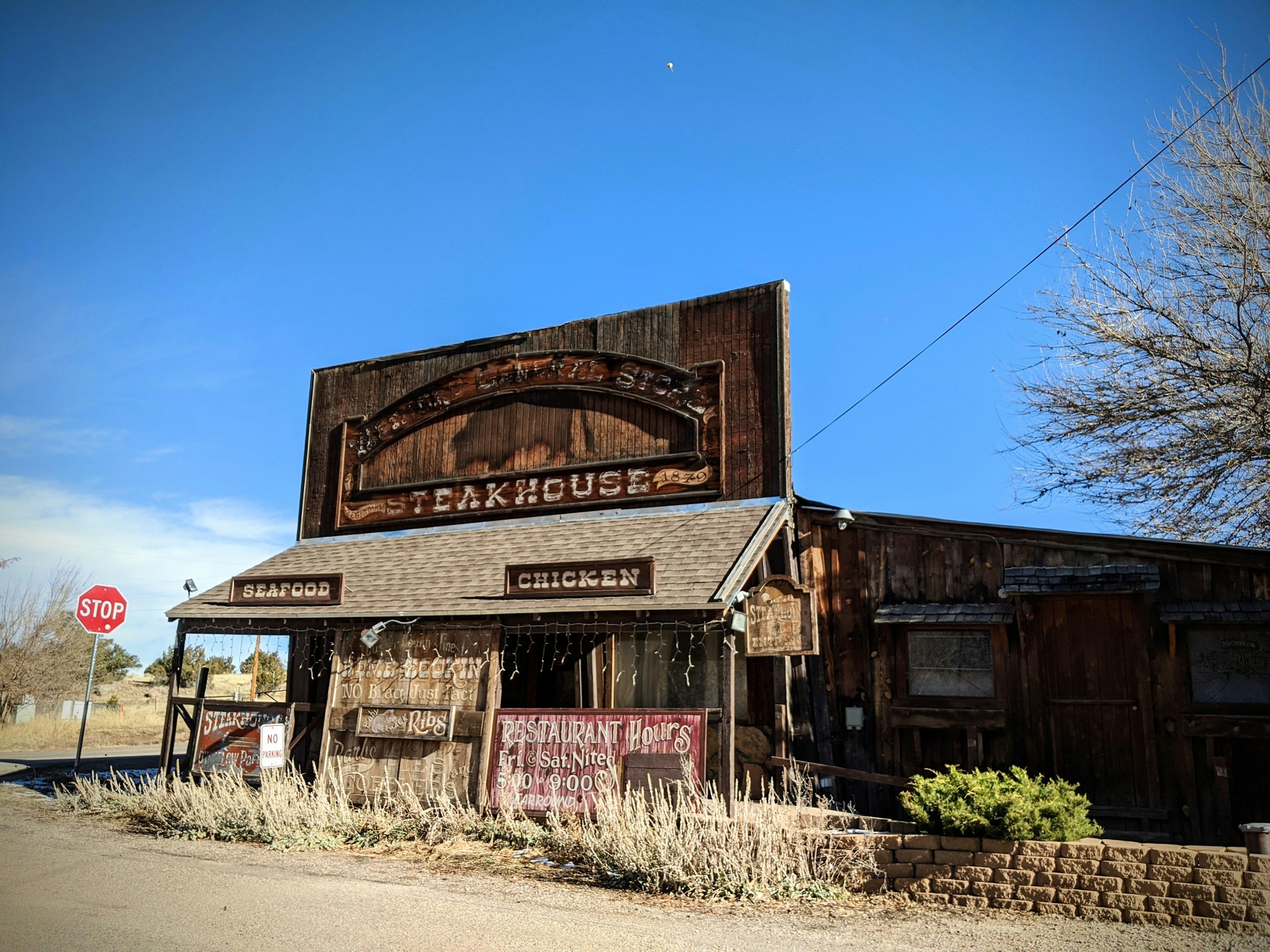 A ramshackle wooden building is seen in Wetmore Colorado