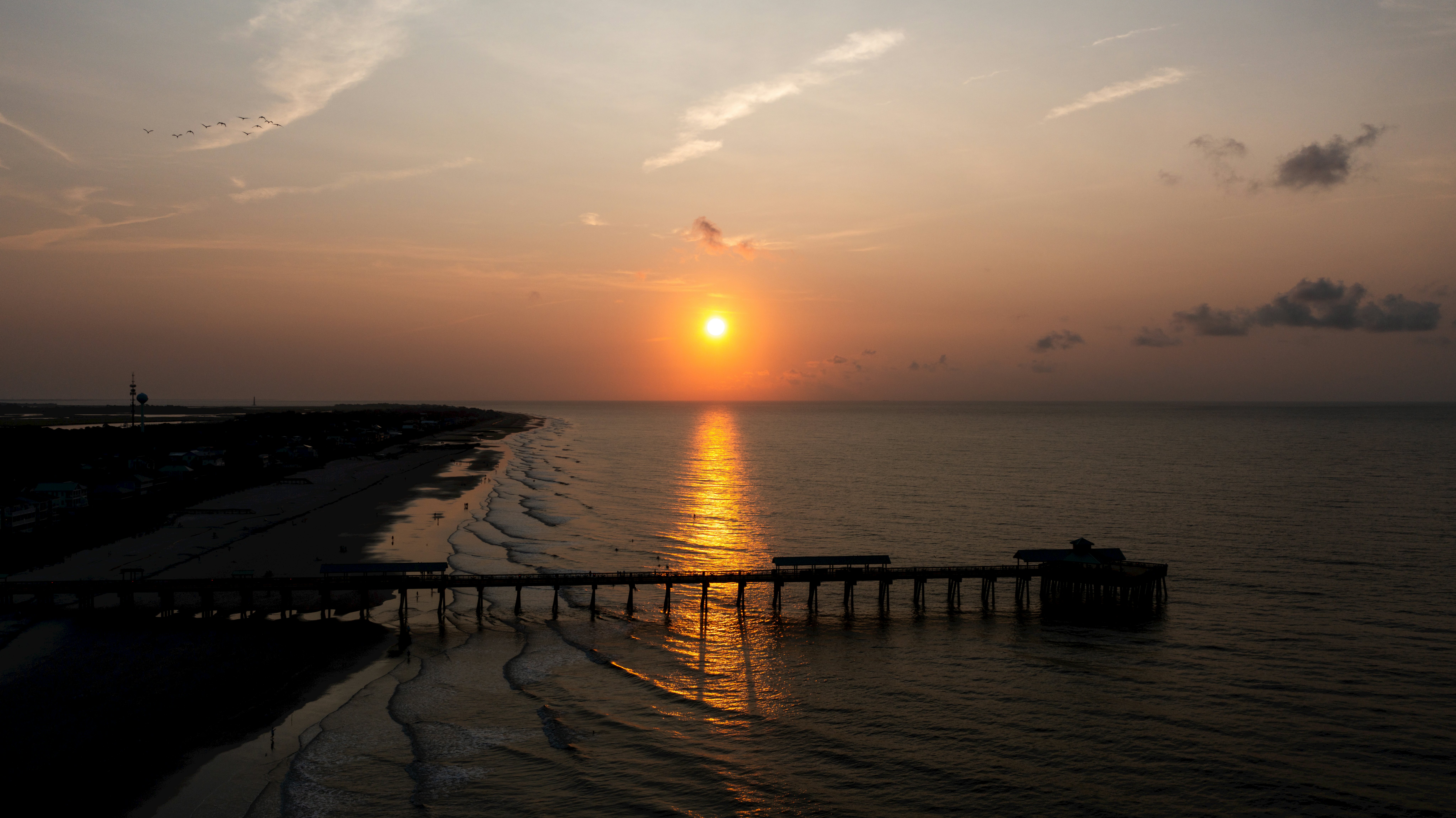 View of a drone sunrise at Folly Beach in Charleston.