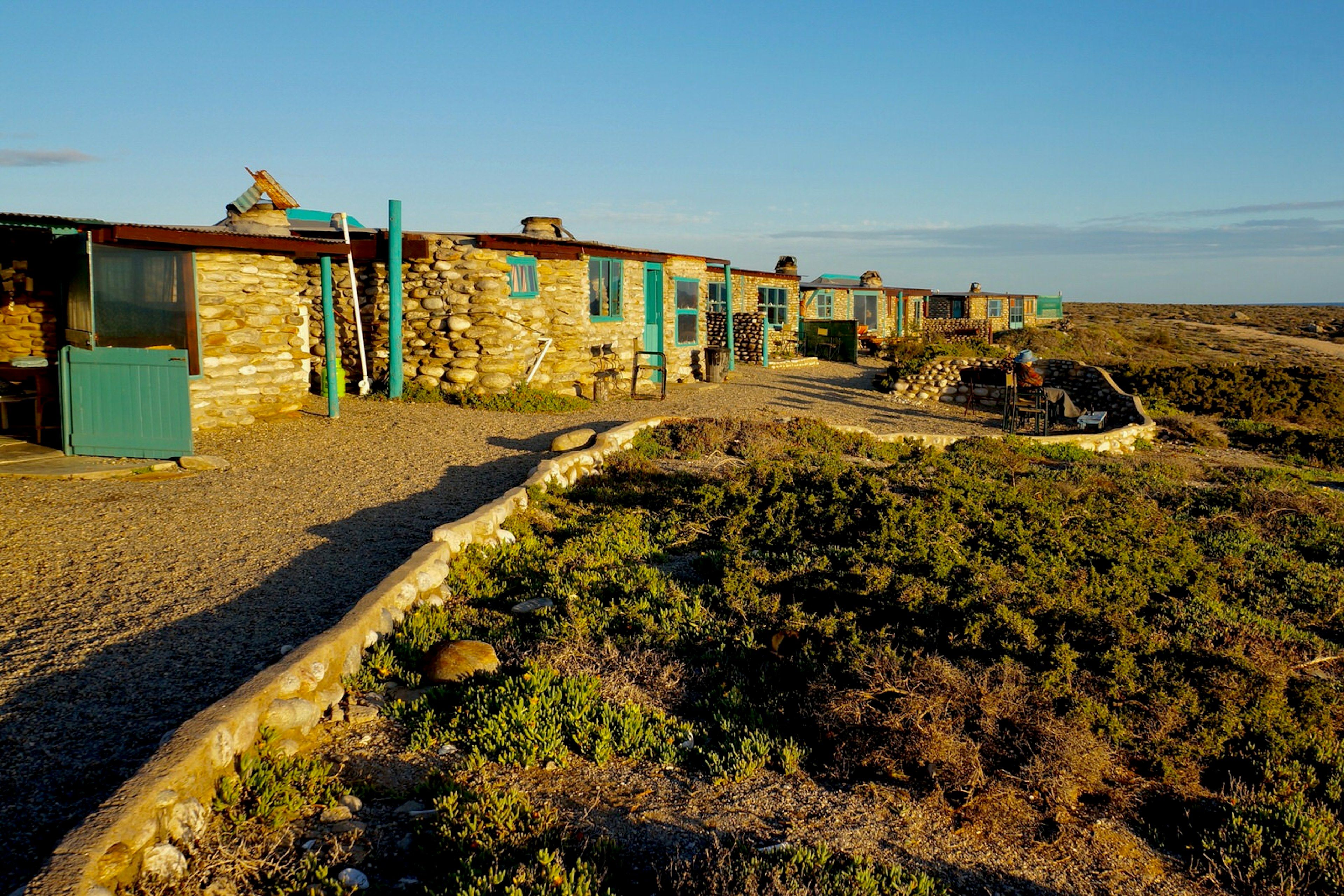 Several stone buildings in a row