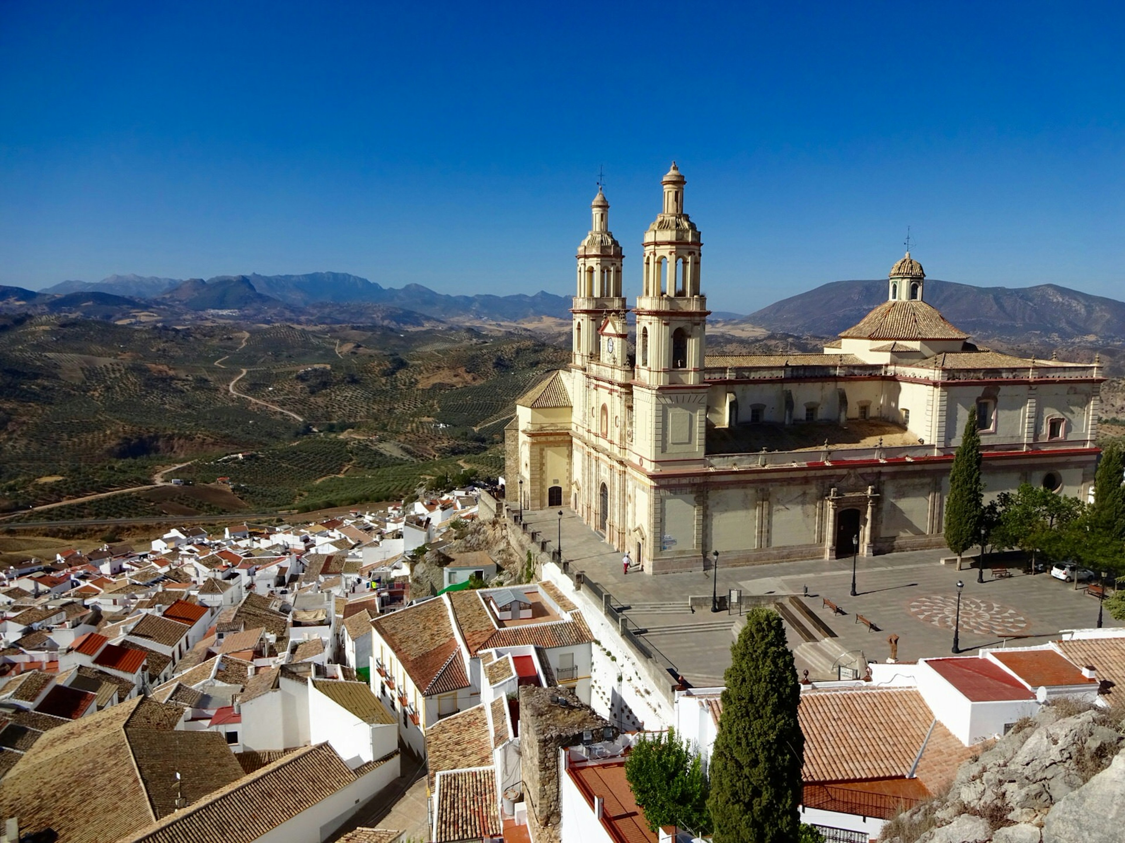 Olvera's neoclassical Iglesia Parroquial Nuestra Señora de la Encarnación, photographed from the 12th-century Castillo Árabe