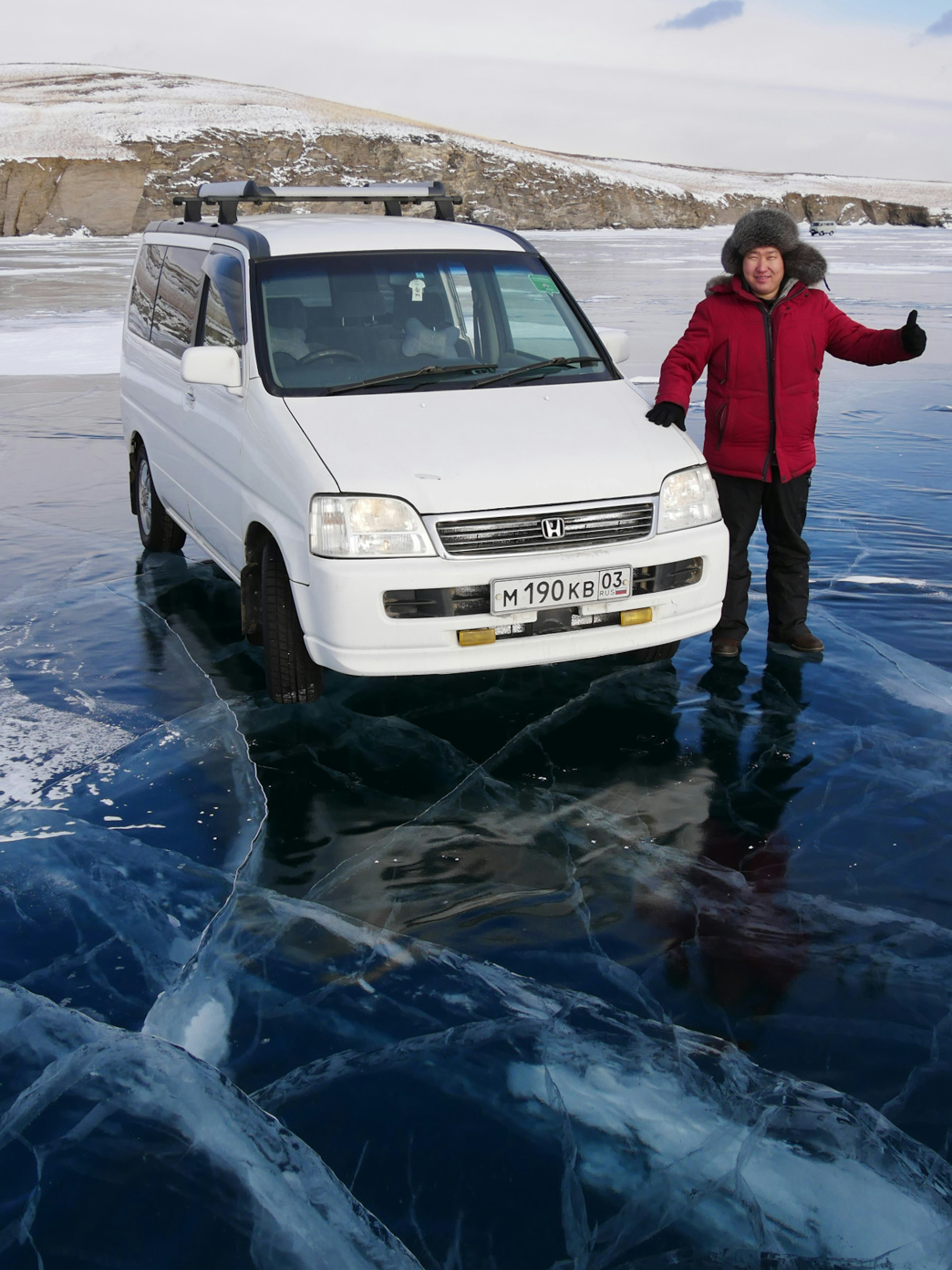 Denis Sobnakov on frozen Lake Baikal in winter © courtesy of Denis Sobnakov