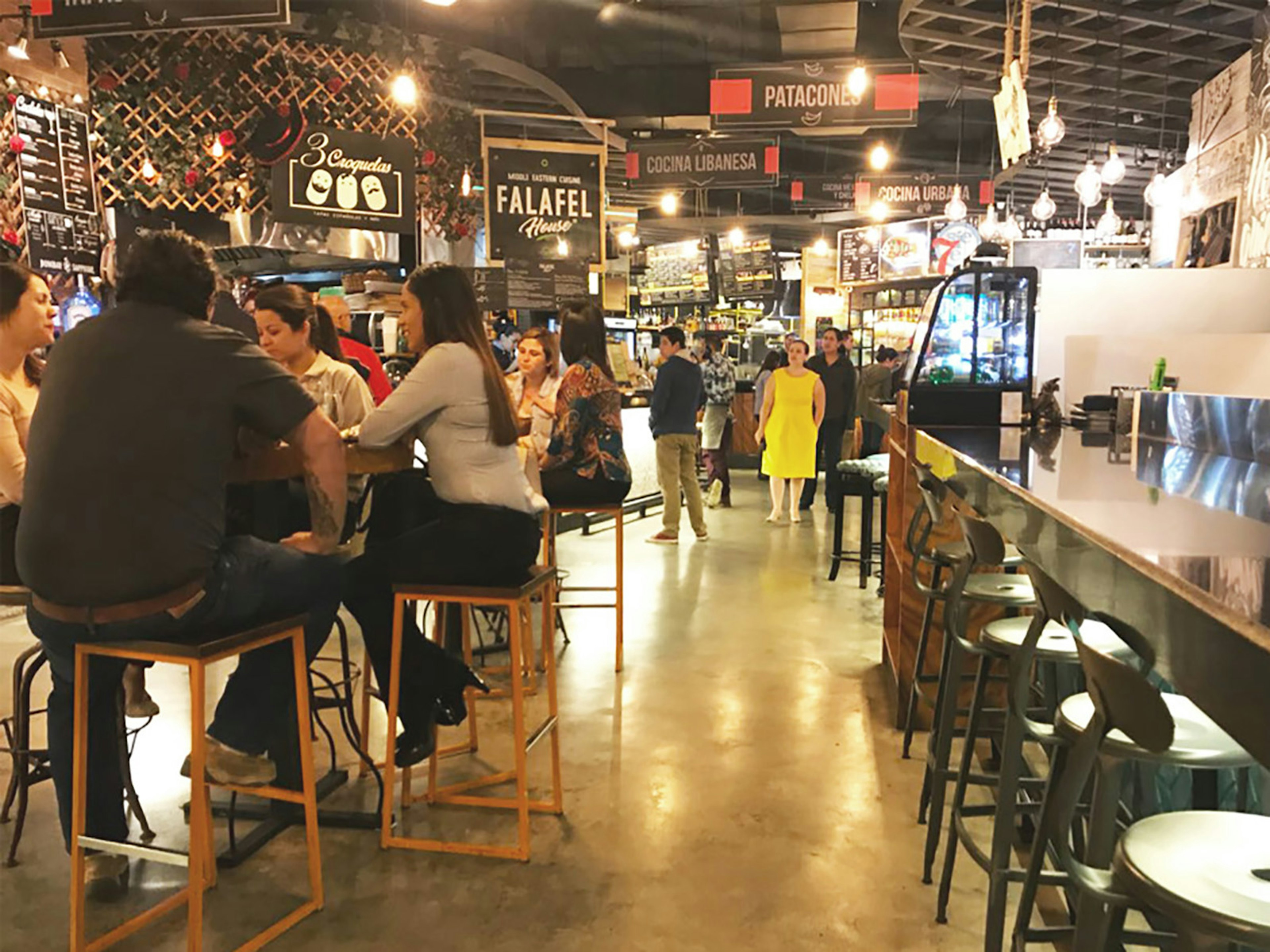 Patrons sit at one of the 13 bars located at El Mestizo in San Juan, Costa Rica Maria Esther Abissi / iBestTravel