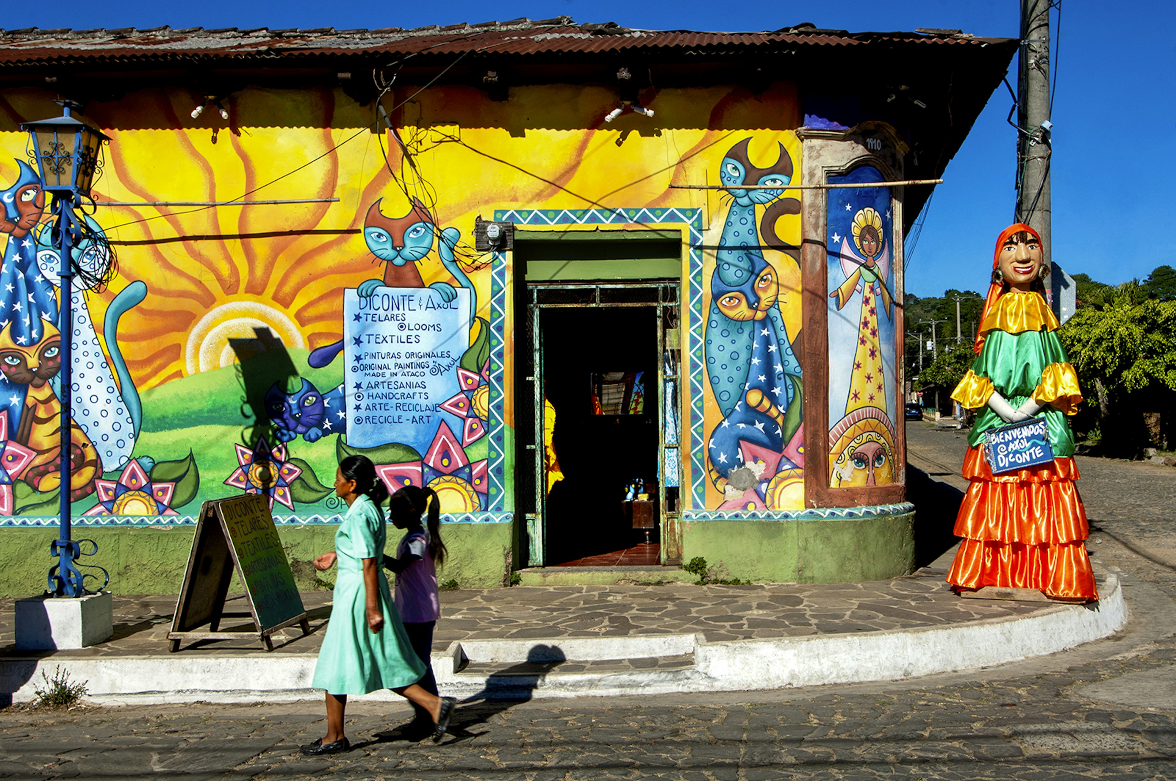 Ataco, El Salvador, Old House, Store Front, Diconte & Axul Crafts Store, Cat Murals, Department Of Ahuachapan, Route Of Flowers, Rutas De Las Flores
530119410
color, Central American, feline, women, visual arts, travel, architecture, girl, outdoors, building, mural painting, people, wall, doll, El Salvador