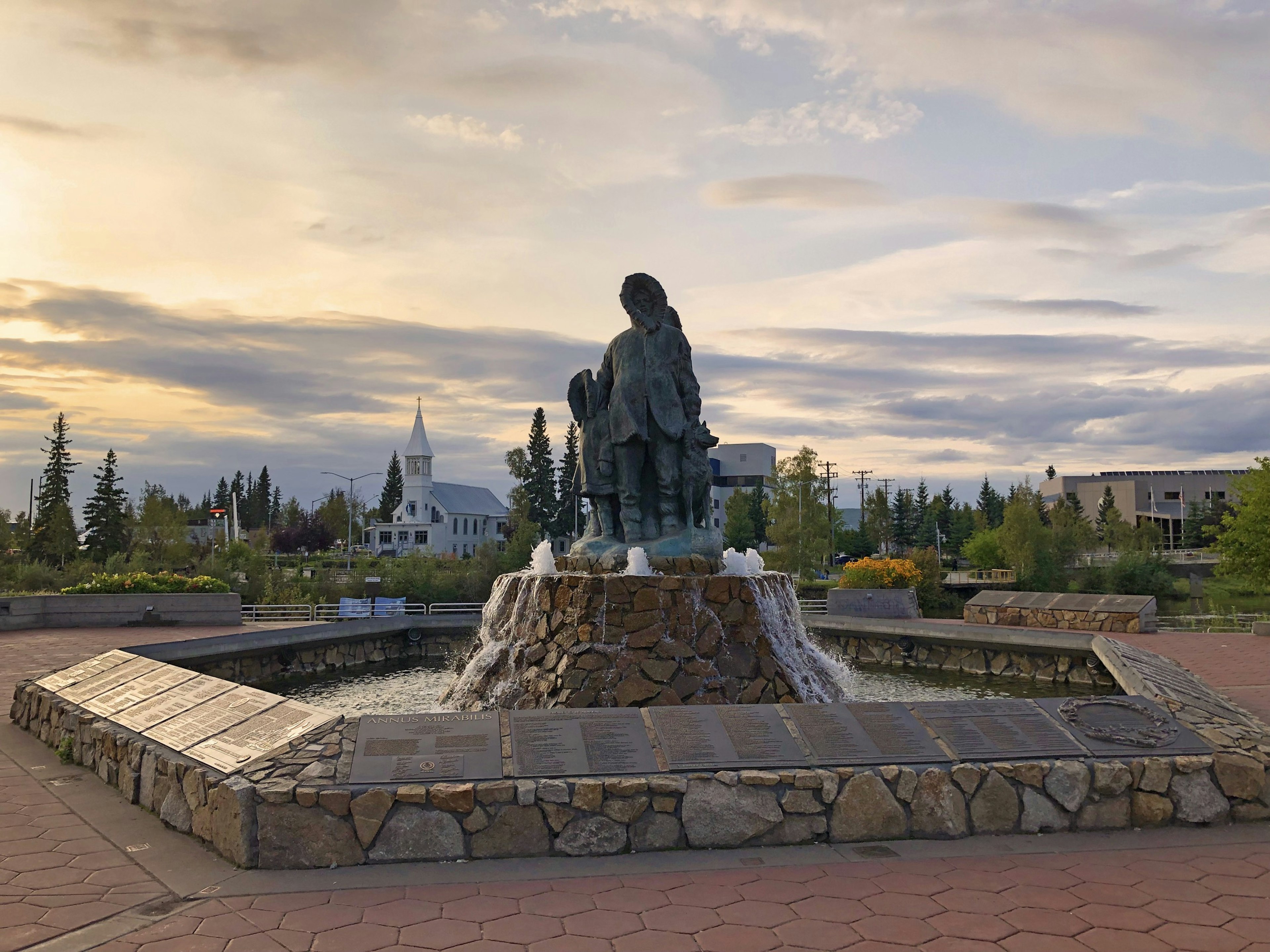 “Unknown First Family” sculpture in Golden Heart Plaza, Downtown, Fairbanks, Alaska