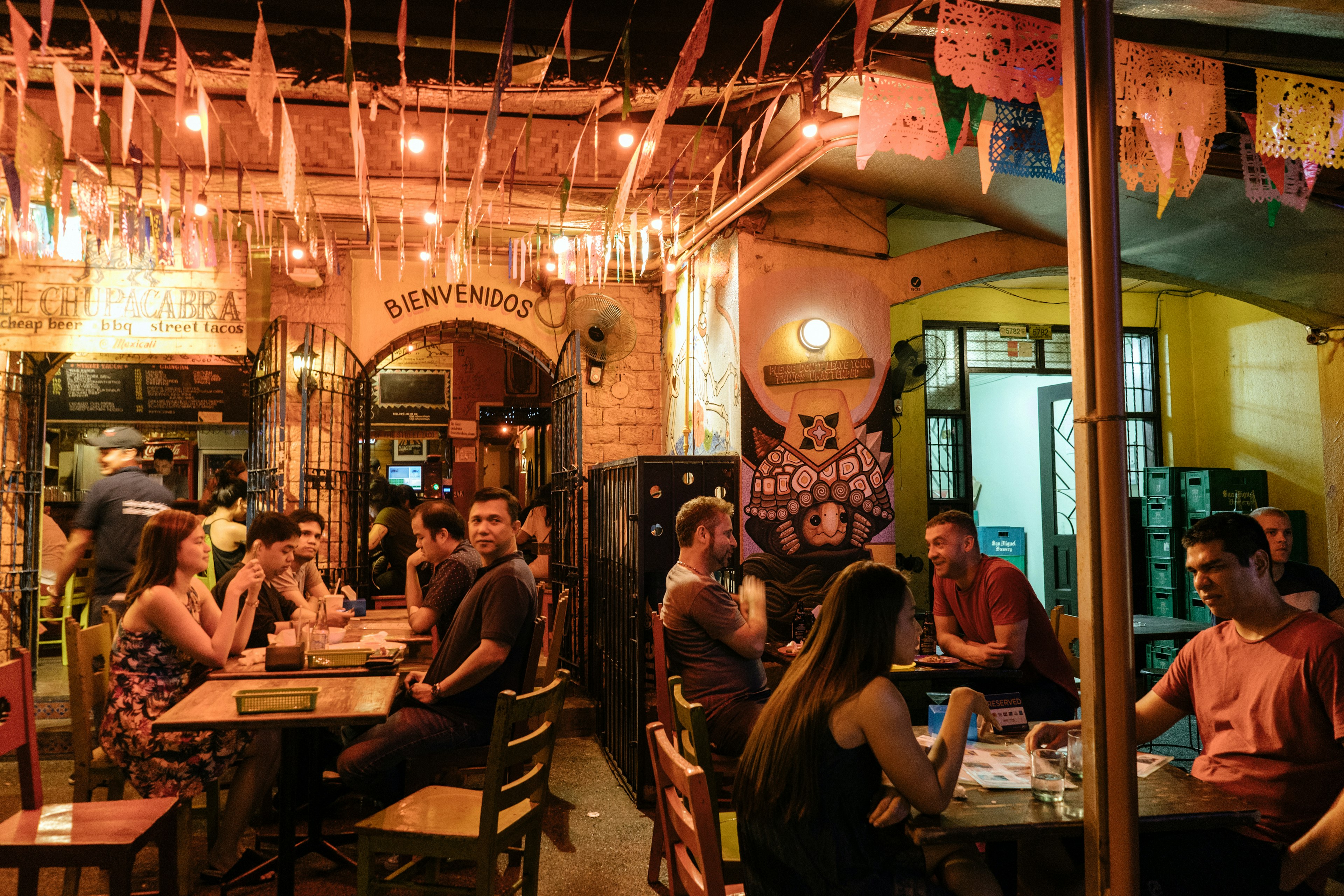 If you want a memorable (and late!) night out, head to the nightlife district of Poblacion. Hannah Reyes Morales/Bloomberg via Getty Images