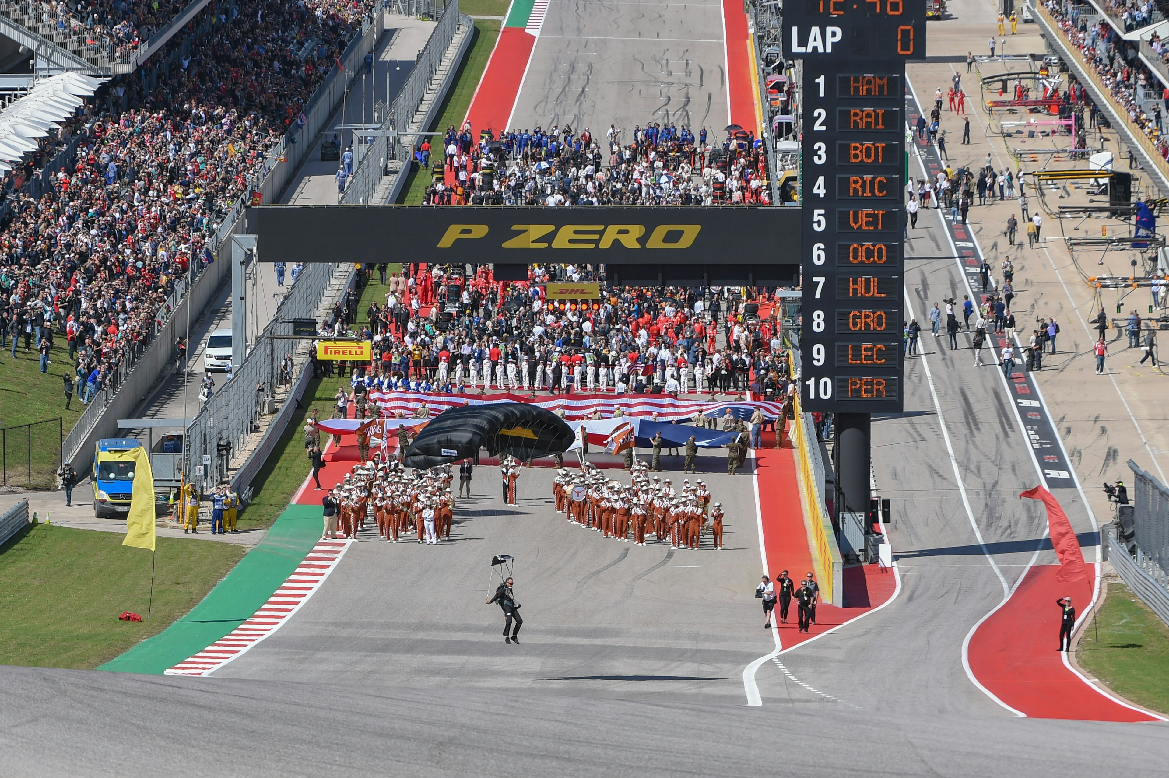 The Army Golden Knights parachute down onto the track before the F1 United States Grand Prix on October 21, 2018, at Circuit of the Americas in Austin, TX.