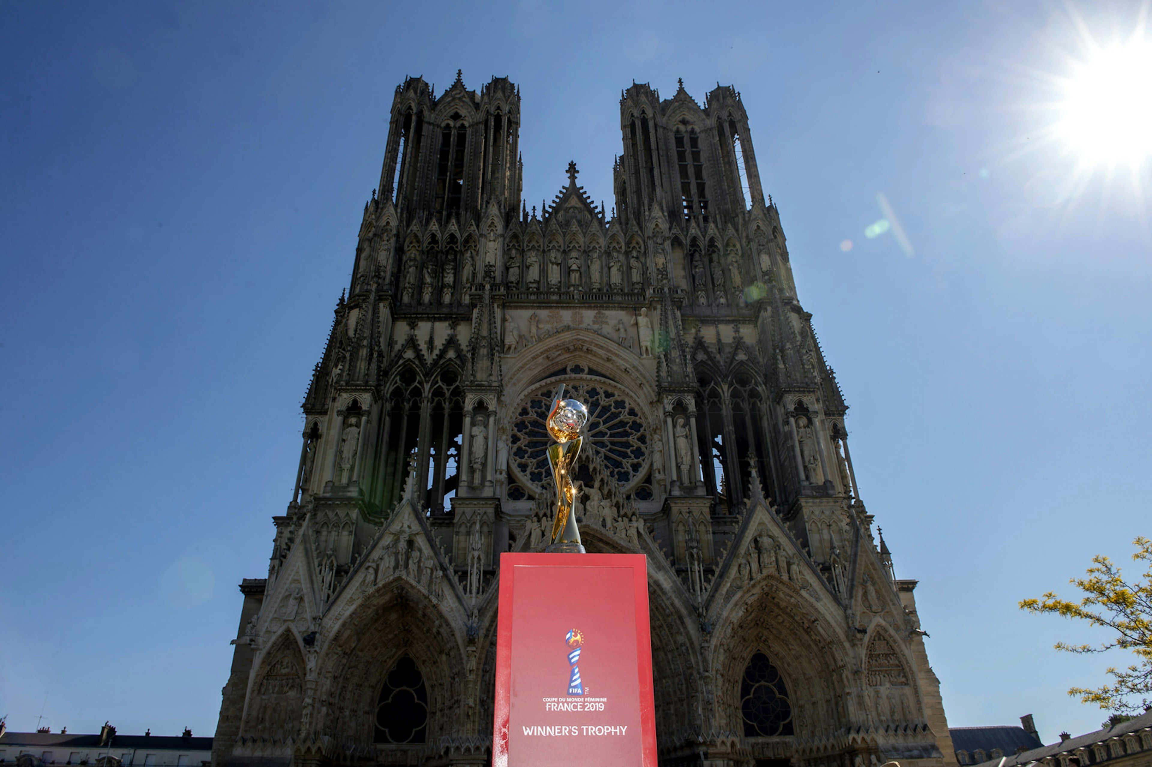 A view of the FIFA Women's World Cup trophy in front of the Gothic towers of Reims Cathedral during the FIFA Women's World Cup France 2019 National Trophy Tour, May 16, 2019