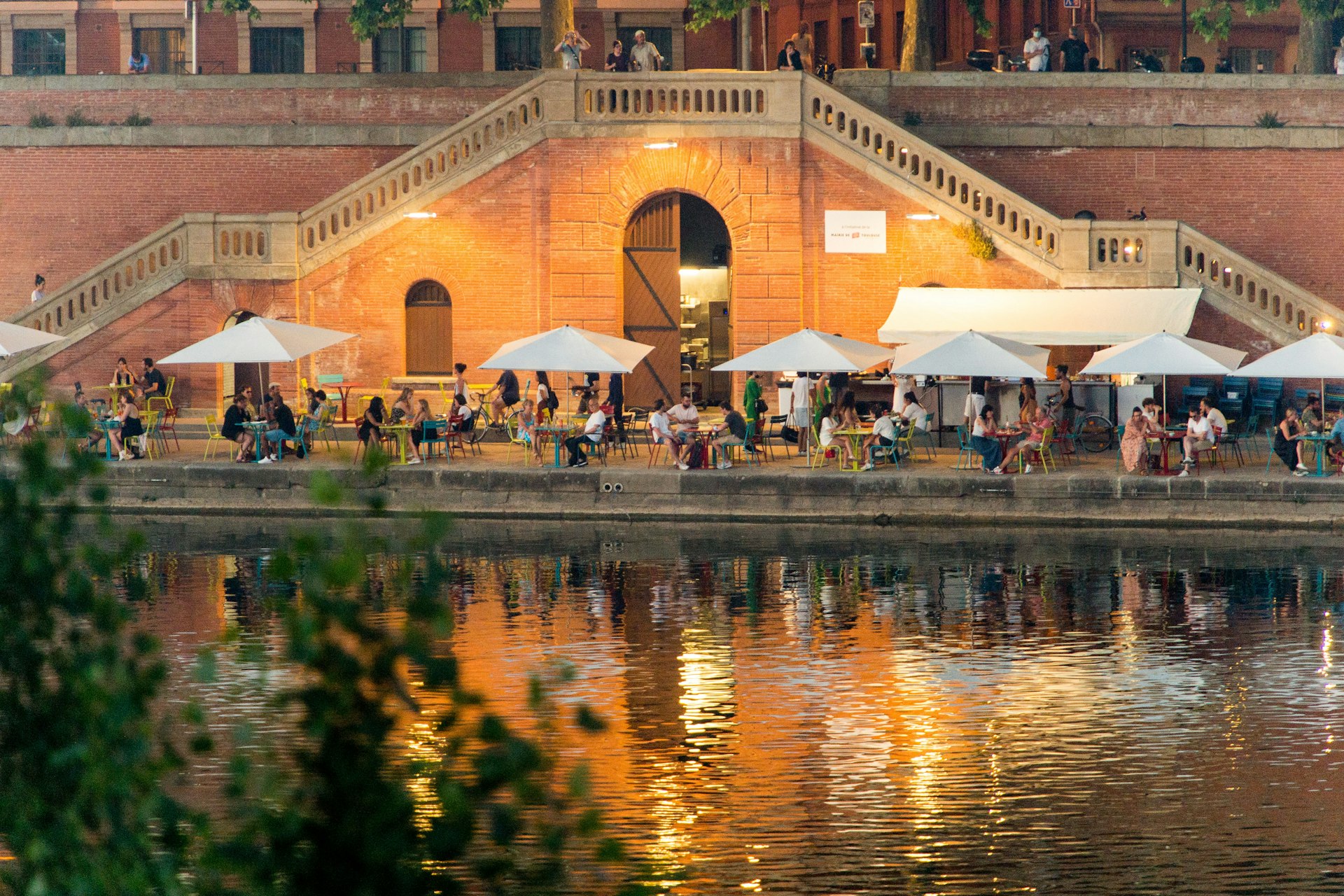 An open-air season cafe, or guinguette, on the banks of the Garonne River, Toulouse