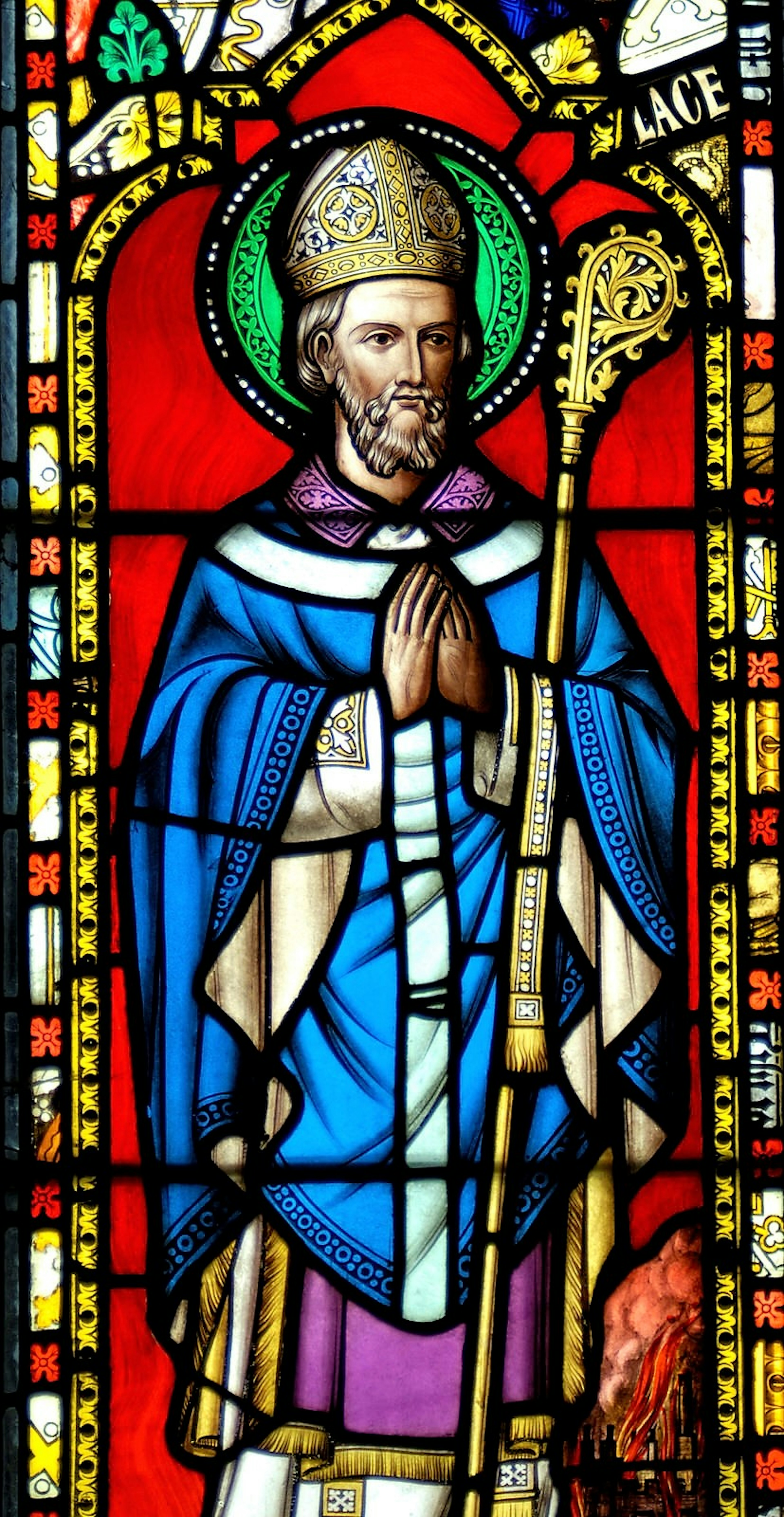 Stained glass window showing St Cuthbert