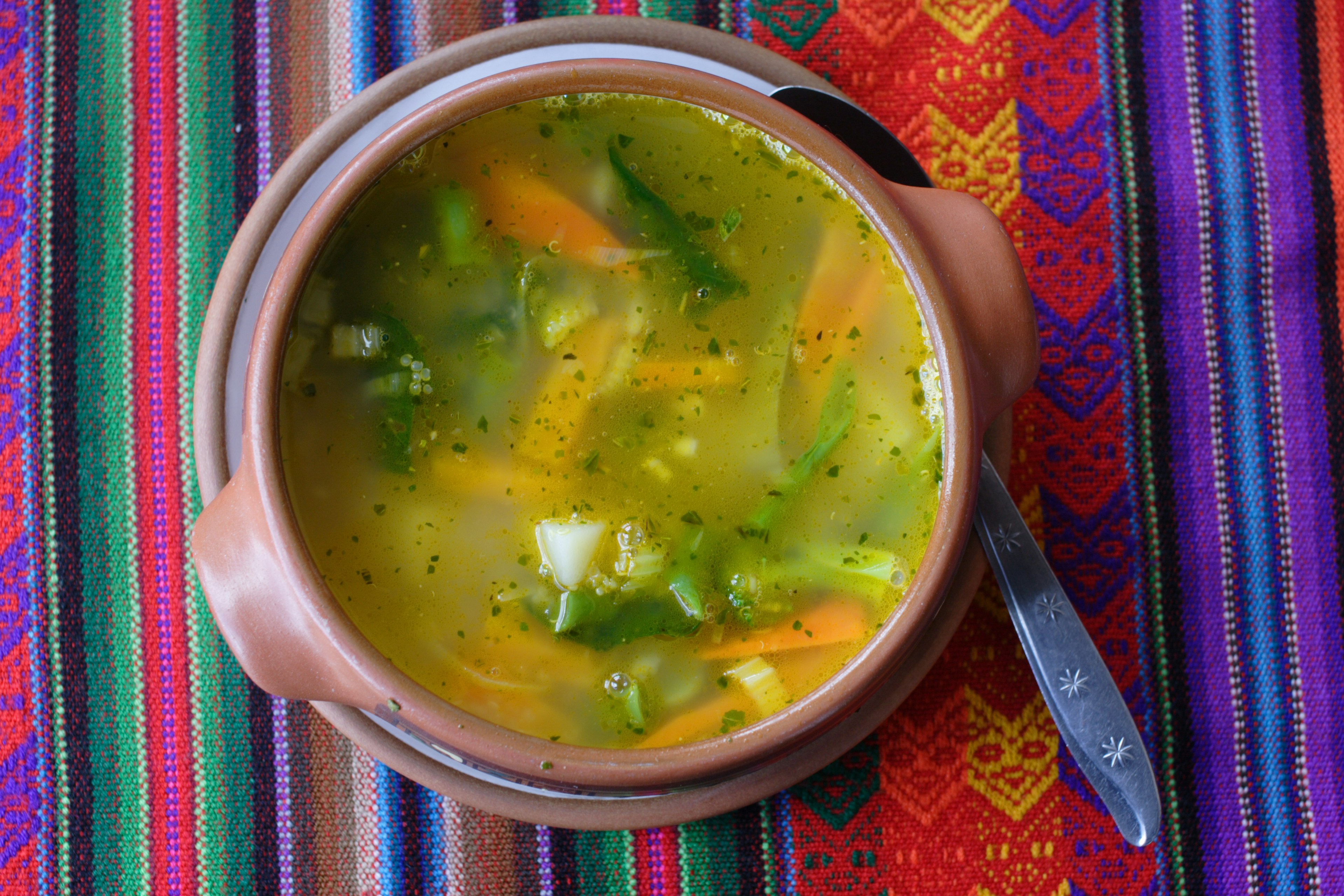 "Vegetable Soup with quinoa served in a clay bowl. This dish was enjoyed while vacationing in Cuzco, Peru, South America.  Quinoa (prounounced keenwah) is a healty Peruvian grain that contains omega 3 oils. The place setting contains a traditional woven Peruvian placemat."
182870703
"Vibrant Color, Bowl, Carrot, Clay, Dietary Fiber, Dishware, Food, Food And Drink, Grain And Cereal Products, Healthy Eating, Inca, Leaf Vegetable, Multi Colored, Peru, Peruvian Culture", Place Mat, Place Setting, Prepared Potato, Quinoa, Soup, Traditional Culture, Travel Locations, Vegan Food, Vegetable, Vegetarian Food, Woven