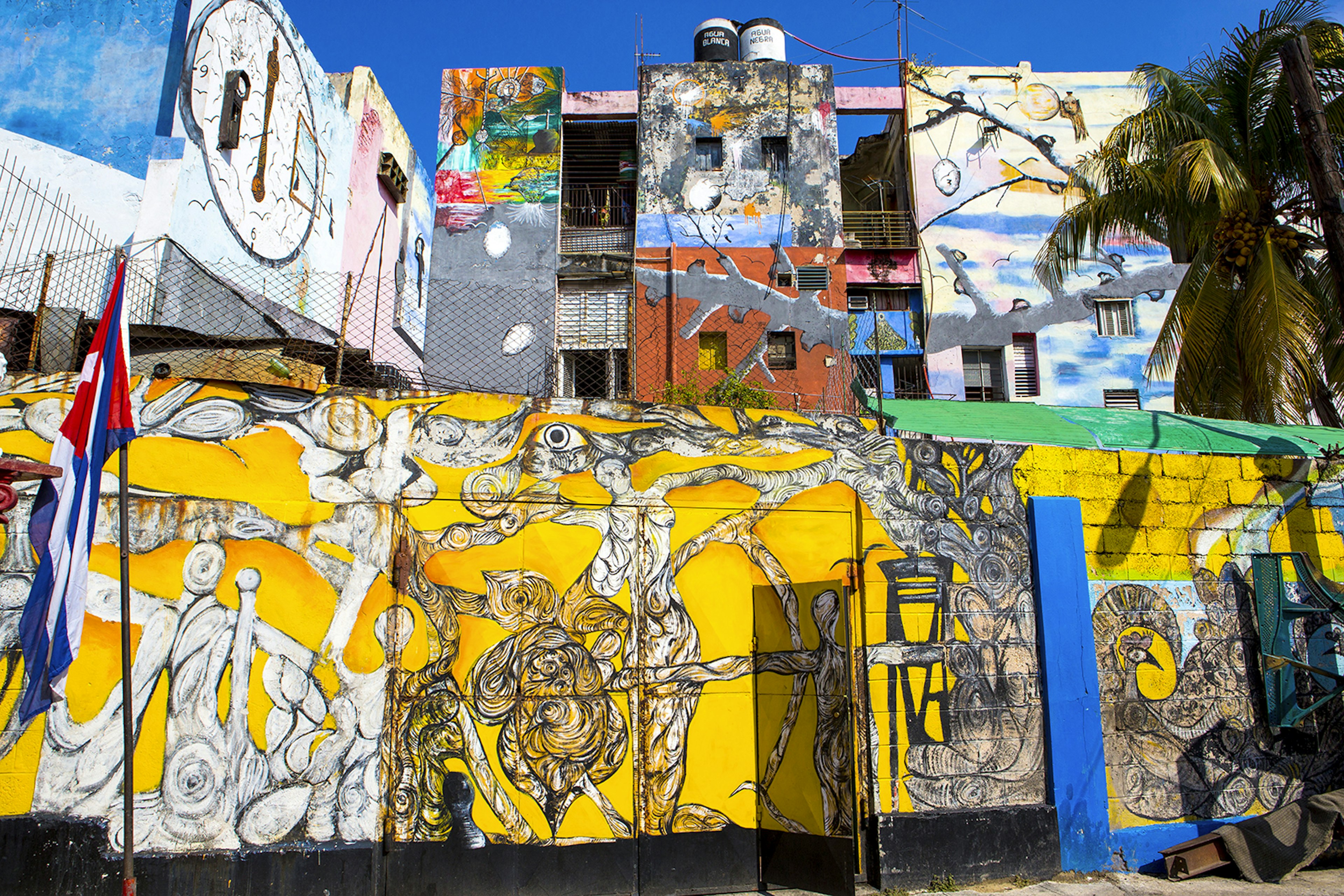 Walls painted with Afro-Caribbean art, Callejon de Hamel, a neighborhood in Havana, Cuba, West Indies, Central America
450762001
travel destination, photography, colour image, horizontal, nobody, wall, painted, afro-caribbean, art, callejon de hamel, neighborhood, havana, cuba, west indies, central america, tourist destination, arts culture and entertainment, creativity, mural, graffiti, bright colour, urban scene, building exterior, architecture, colourful