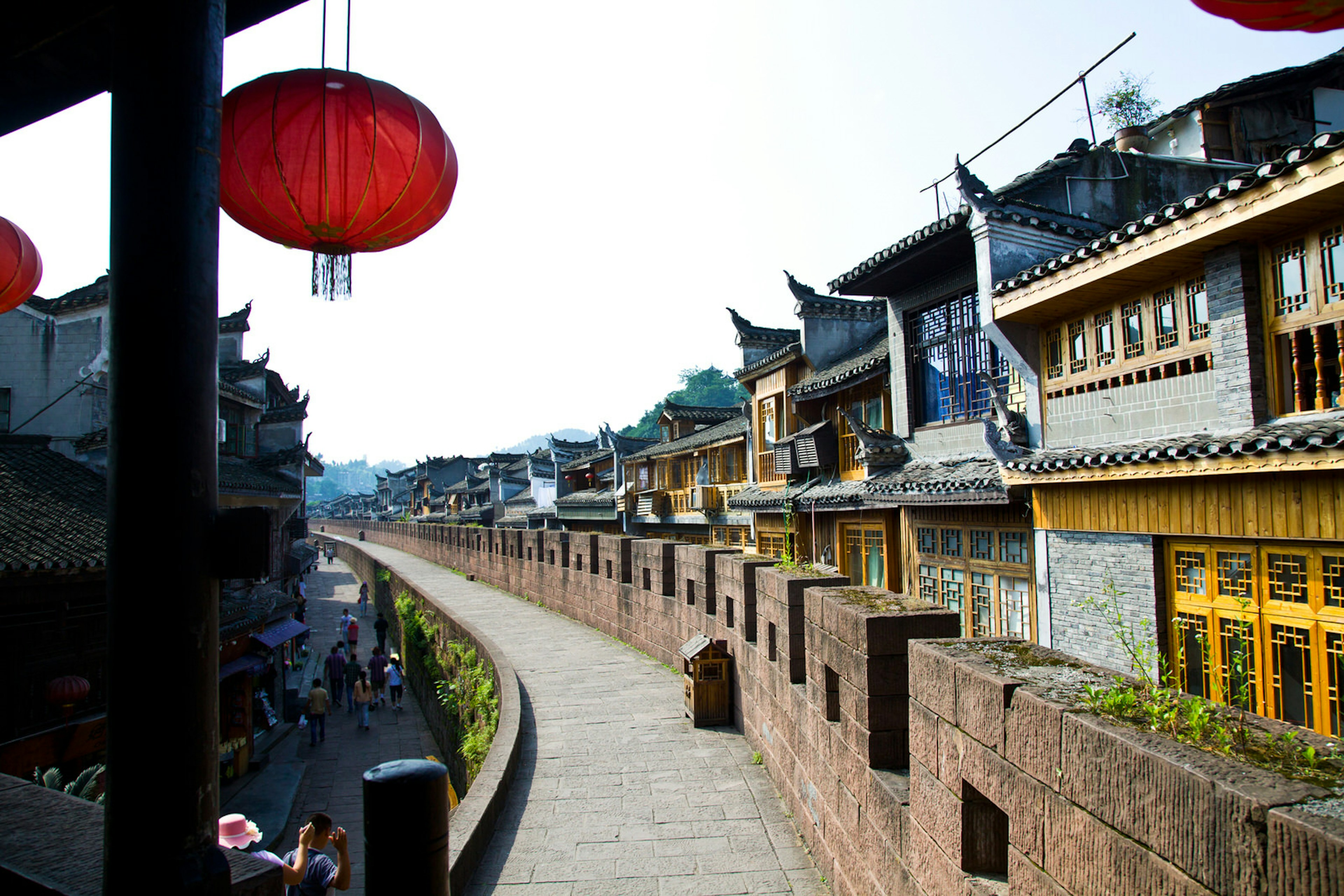 Fenghuang's restored Ming-era wall runs through the city ? View Stock / Getty