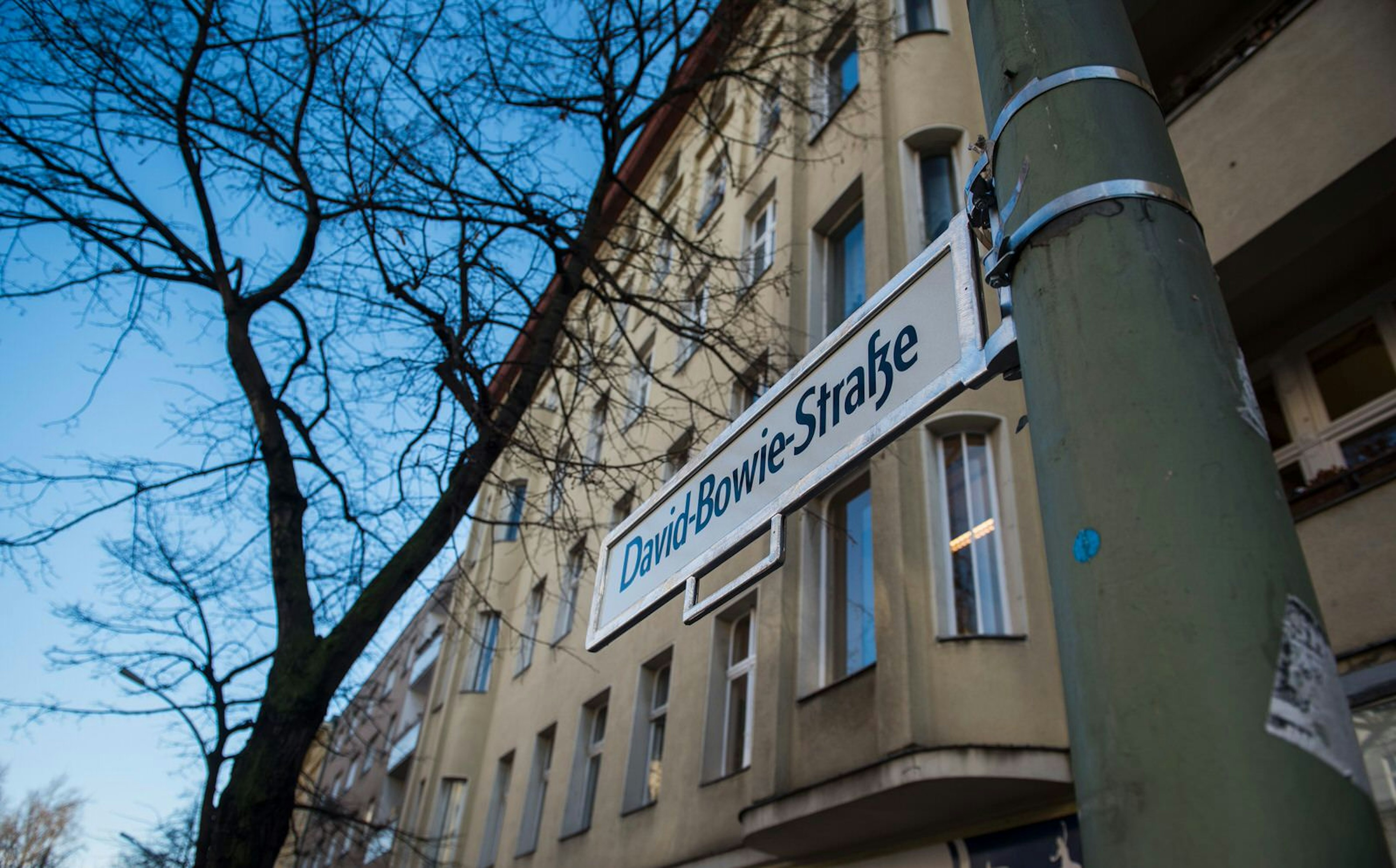 A street sign reading David Bowie Strasse is pictured in Berlin's Hauptstrasse as a tribute to British rock icon David Bowie outside his former home in Hauptstrasse 155 in Berlin