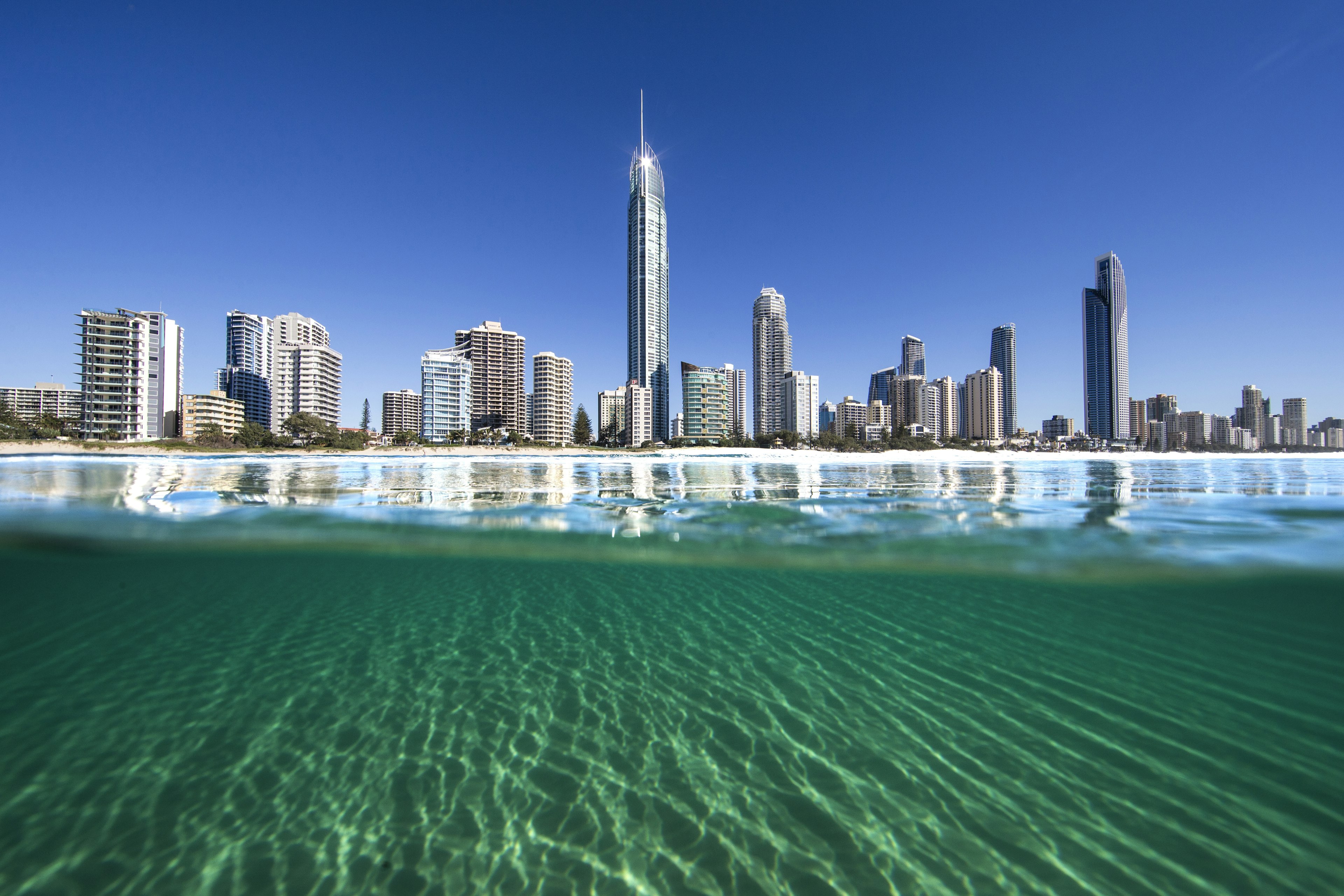 514445919
"no people, horizontal, outdoors, day, clear sky, building exterior, architecture, skyscraper, city, cityscape, skyline, sea, travel destinations, modern, surfer's paradise, australia, gold coast, water surface"