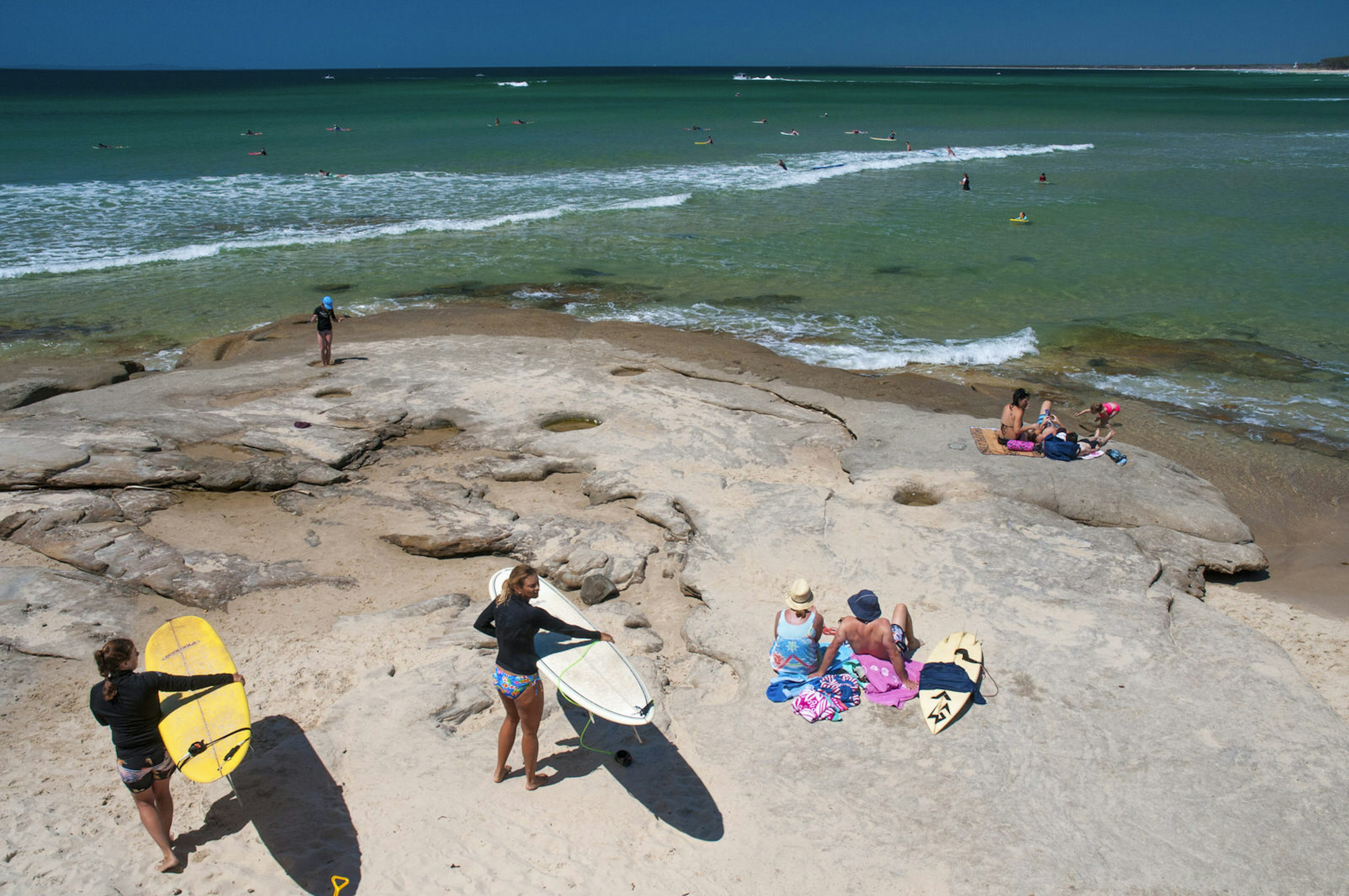 Female surfers at Bulcock Beach, Caloundra, Sunshine Coast