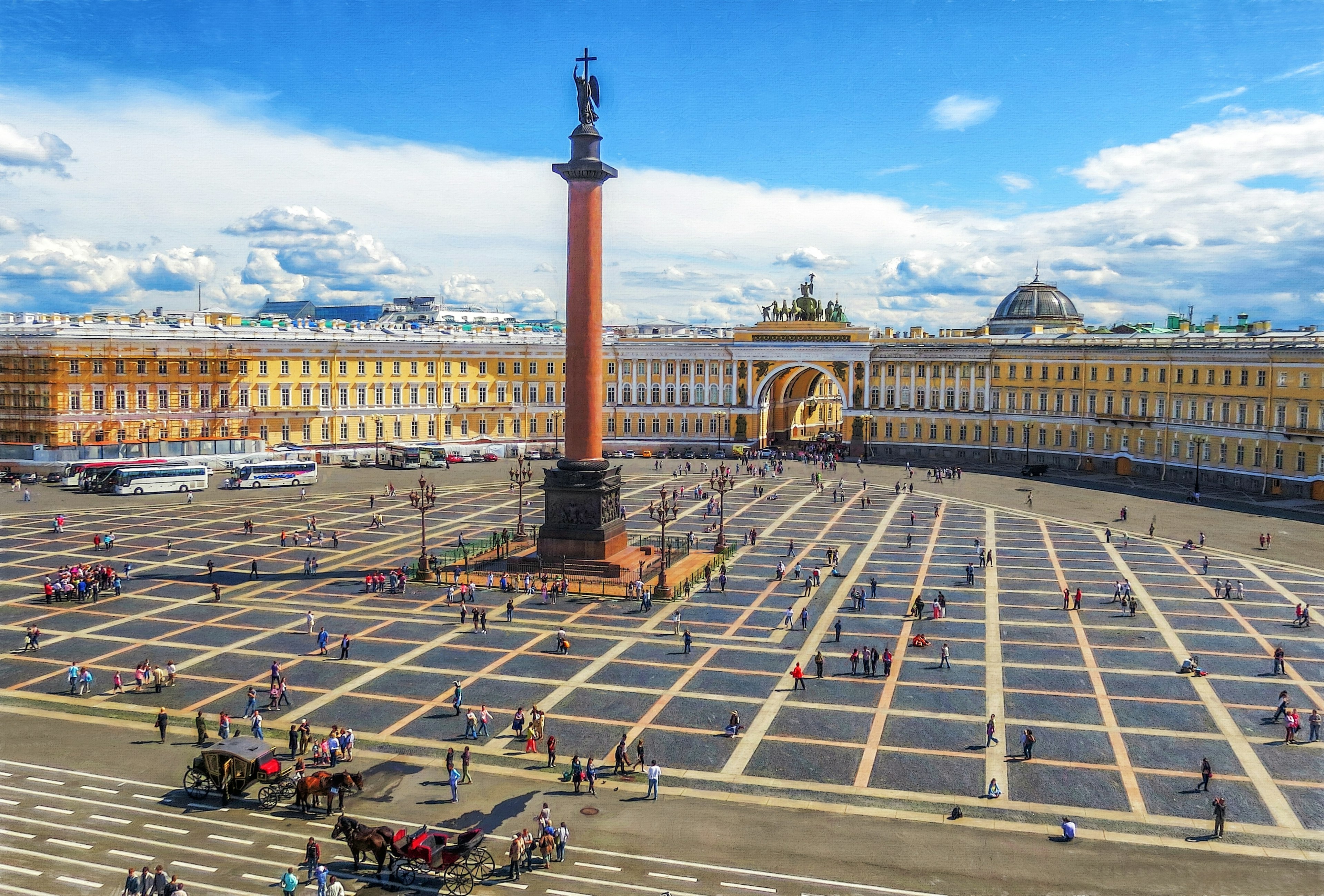 A view across a vast, immaculate courtyard that culminates in elegant baroque archways, as seen from the Hermitage Museums in St Petersburg, Russia