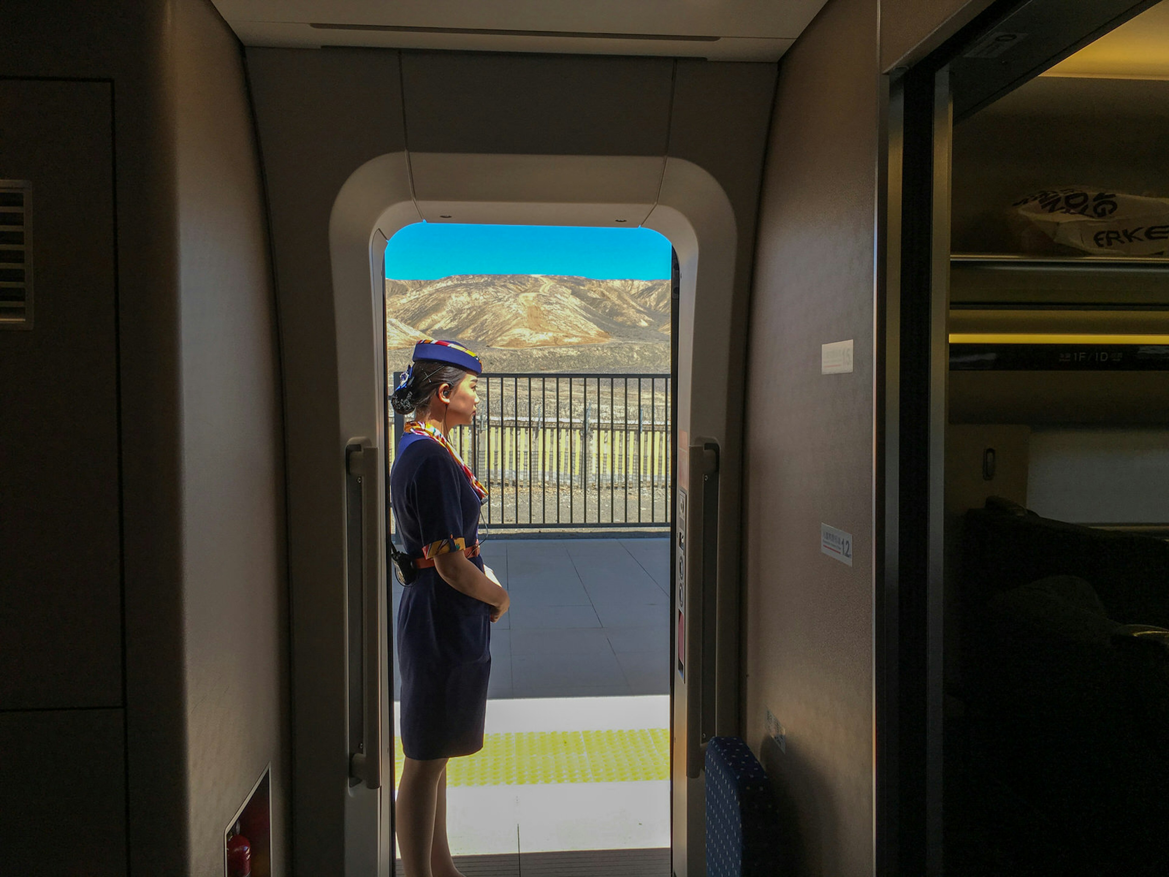 A high-speed train stopped for boarding at Turpan along the Silk Road in Xinjiang province © Zhang Peng / Getty