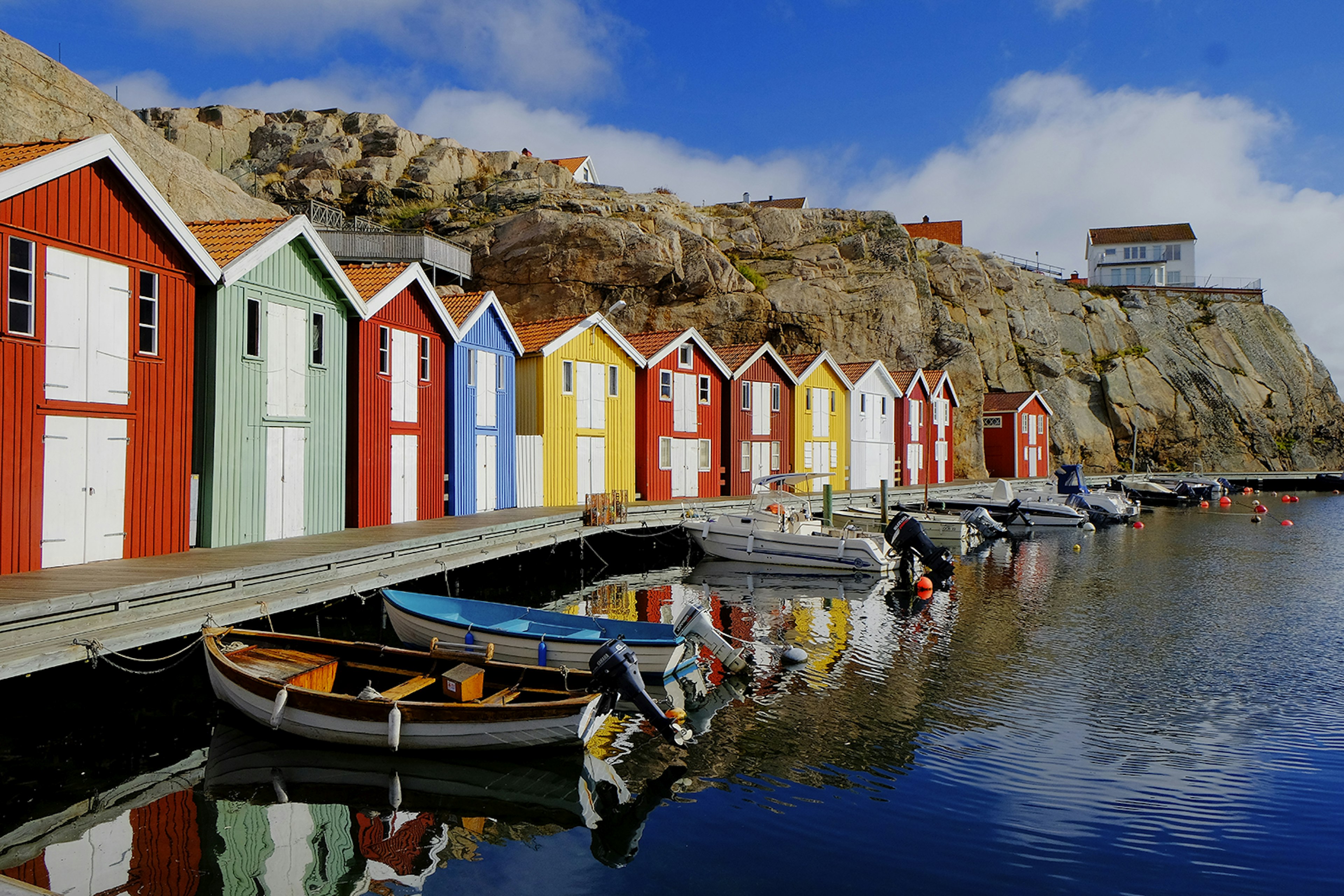 551421501
boat, boat house, Bohuslan, building exterior, coast, color image, day, fishing hut, harbour, horizontal, house, idyll, jetty, life on sea, mooring, multi colored, nature, no people, outdoors, reflection, row, Scandinavia, scenic, sea, shed, Smogen, summer, sunny, Sweden, water, wooden house
Colorful fishing huts at water