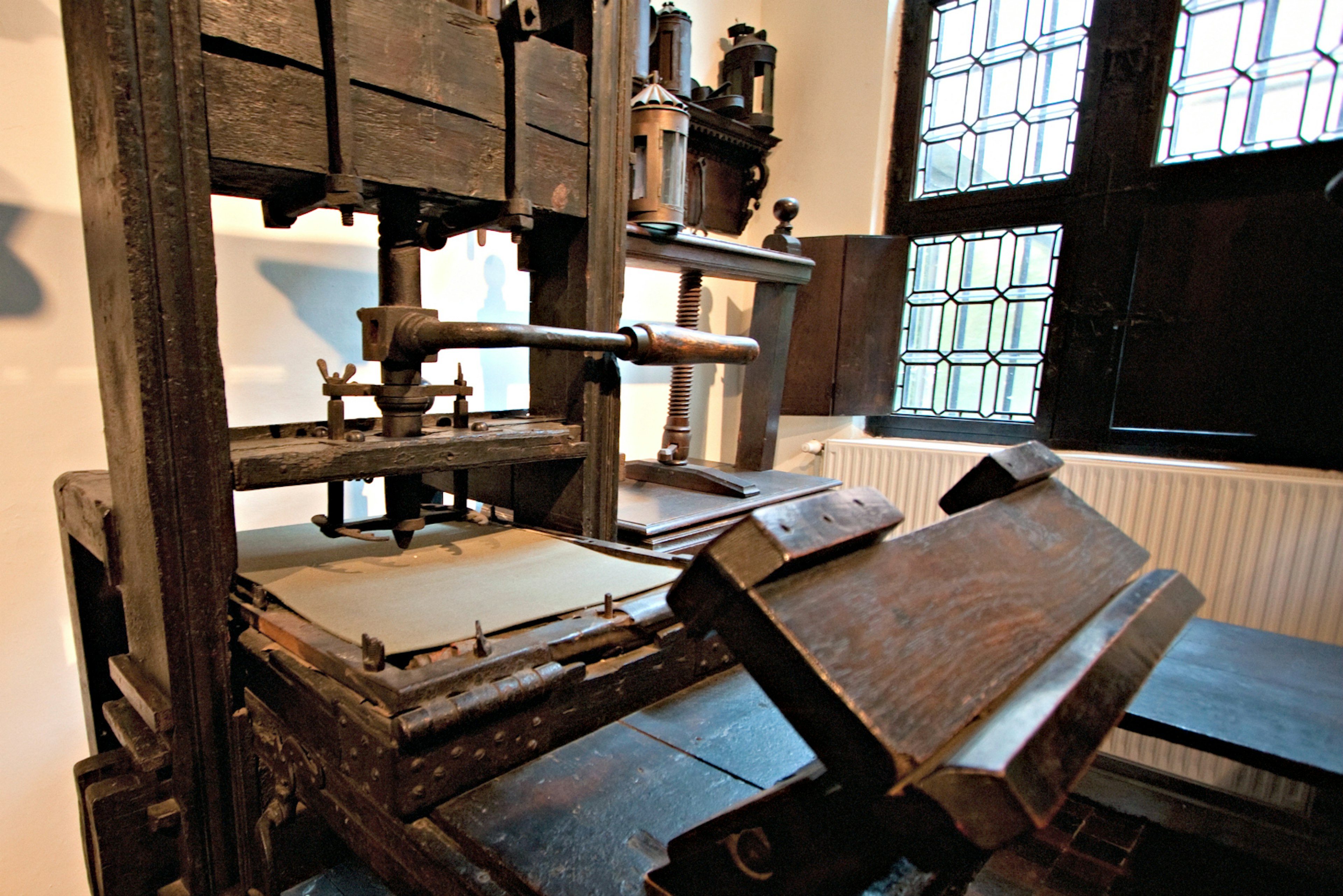 Two of the world's oldest printing presses on display in the printing room of the Plantin-Moretus House-Workshops-Museum, Antwerp, Belgium