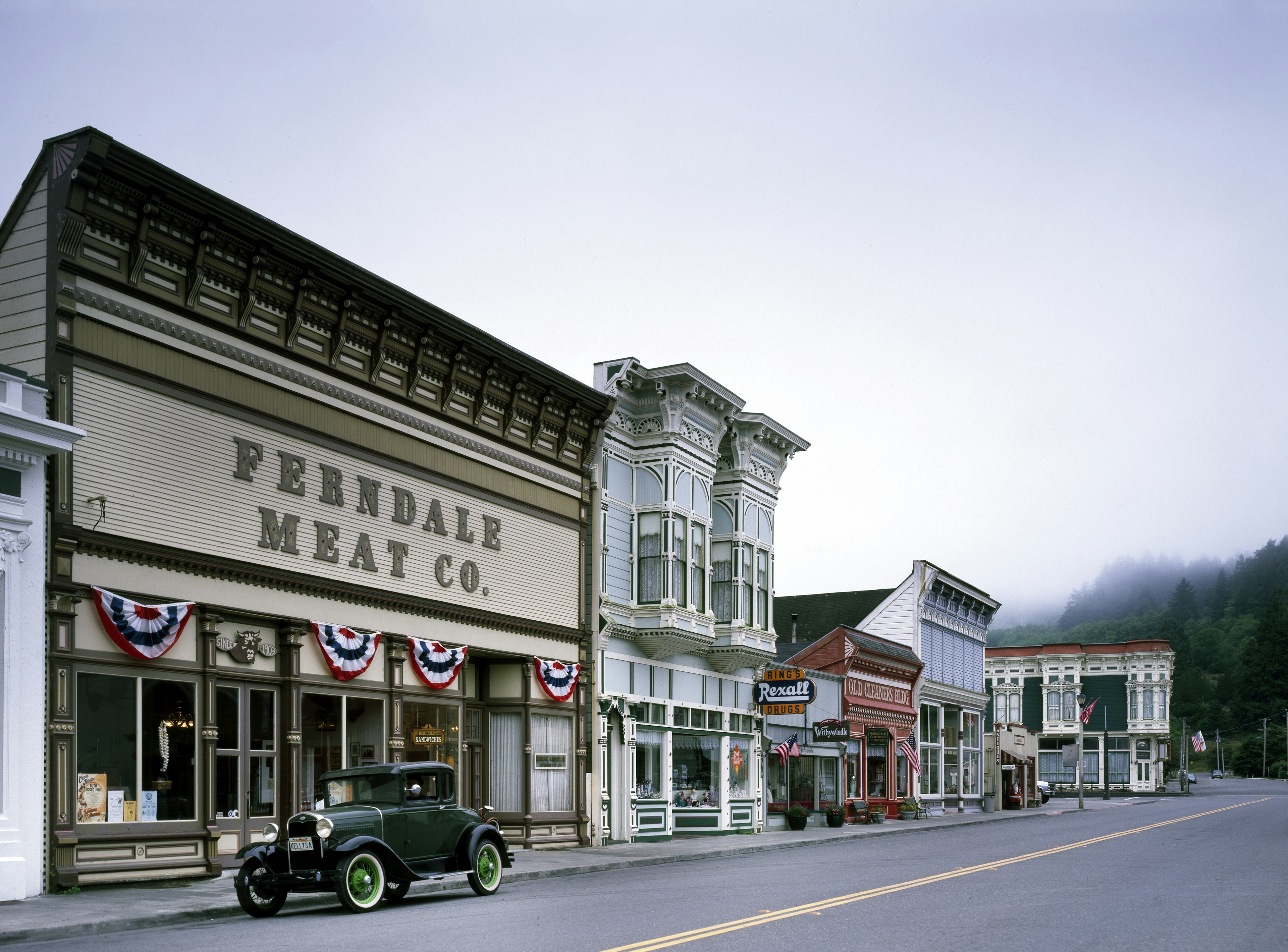 An antique truck looks right at home parked in front of the western facade of the Ferndale Meat Co.