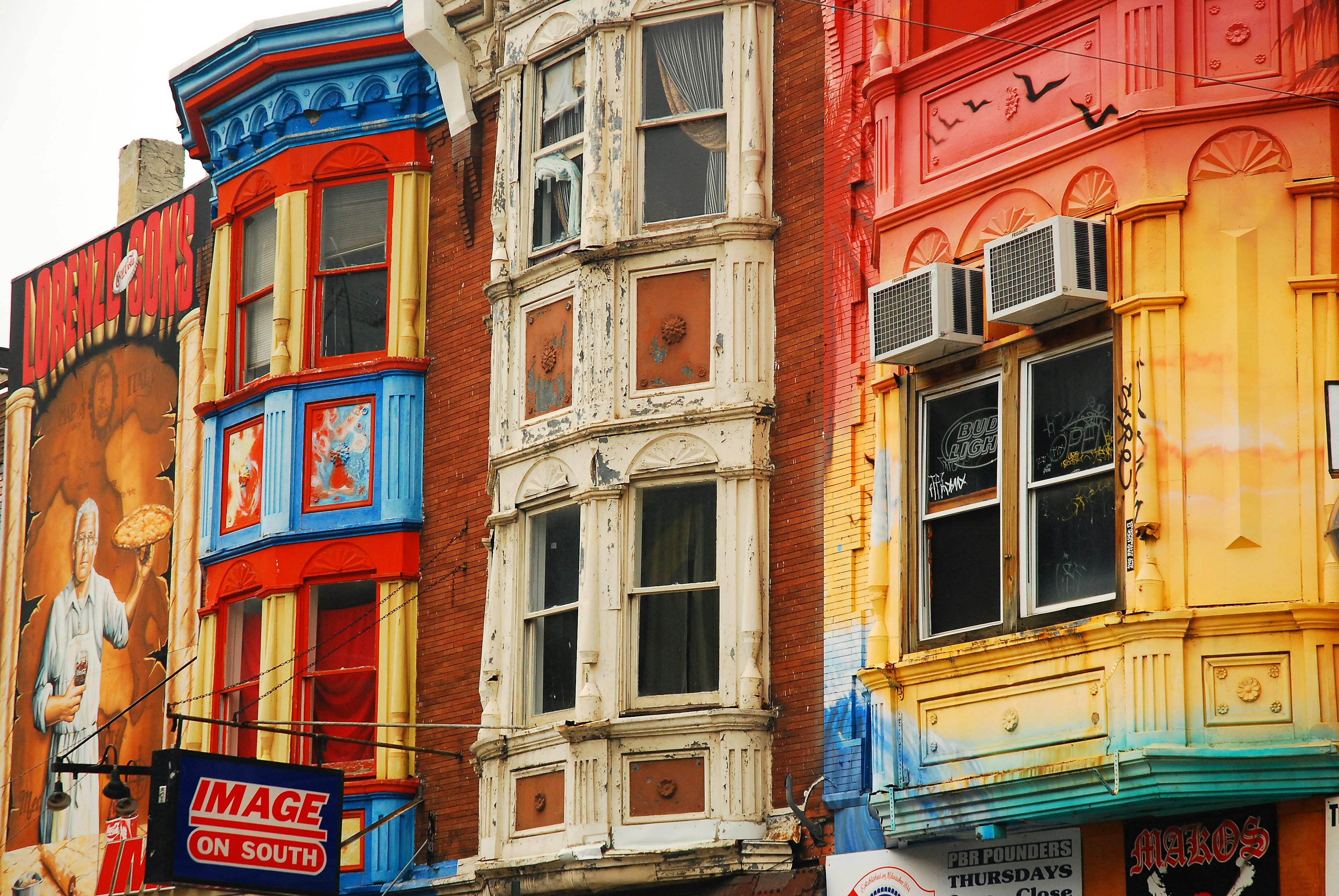 rainbow-hued row houses in Queen Vilage