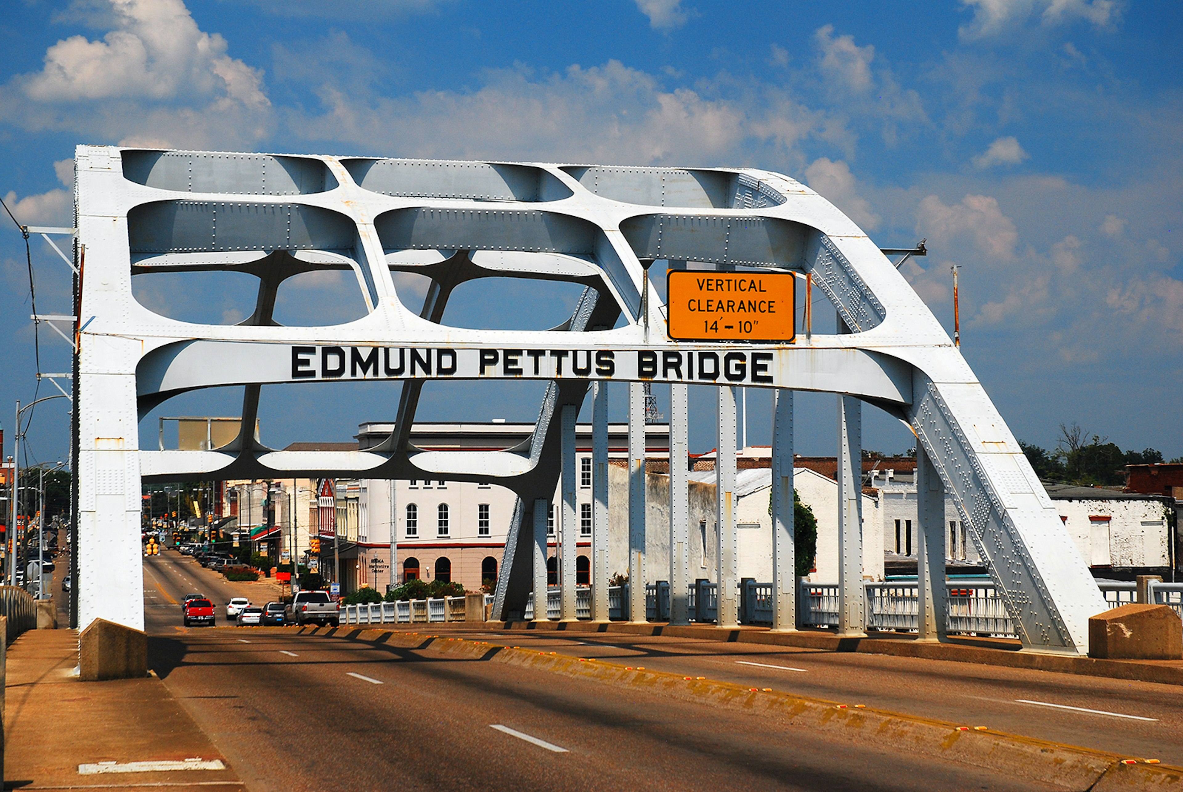 694661624
Selma, Alabama, Edmund, Pettus, Bridge, Edmund Pettus Bridge, National, Historic, Monument, famous, sight, Martin, Luther, King, Martin Luther King, protest, march, Montgomery, civil, rights, civil rights, fight, riot, melee, brutal, brutality, police, killed, injured, marchers, span, spanning, connect, connecting, Through, Arch, Through Arch Bridge, road, street, cars, traffic, small, town, small town, steel, transport, transportation, infrastructure, black, African, American, African American, scene, Bloody, Sunday, Bloody Sunday, protesters, old, history, historical, outside, outdoors, exterior, day, daytime, sun, sunny, sunshine, south, east, southeast, southern, eastern, southeastern, Dixie, Confederate, United, States, of, America, United States, United States of America, US, USA, Kirkikis, photography, photos, photographs, images, pictures, pics, pix, travel, traveling, tourism, tourist, attraction, sightseeing, landscape, scenic, scenery, destination, vacation, holiday, North America
Selma, AL, USA September 14, 2011 The Edmund Pettis Bridge in Selma, Alabama was the scene of bloody riots during Martin Luther King's initial march to Montgomery for Voting Rights