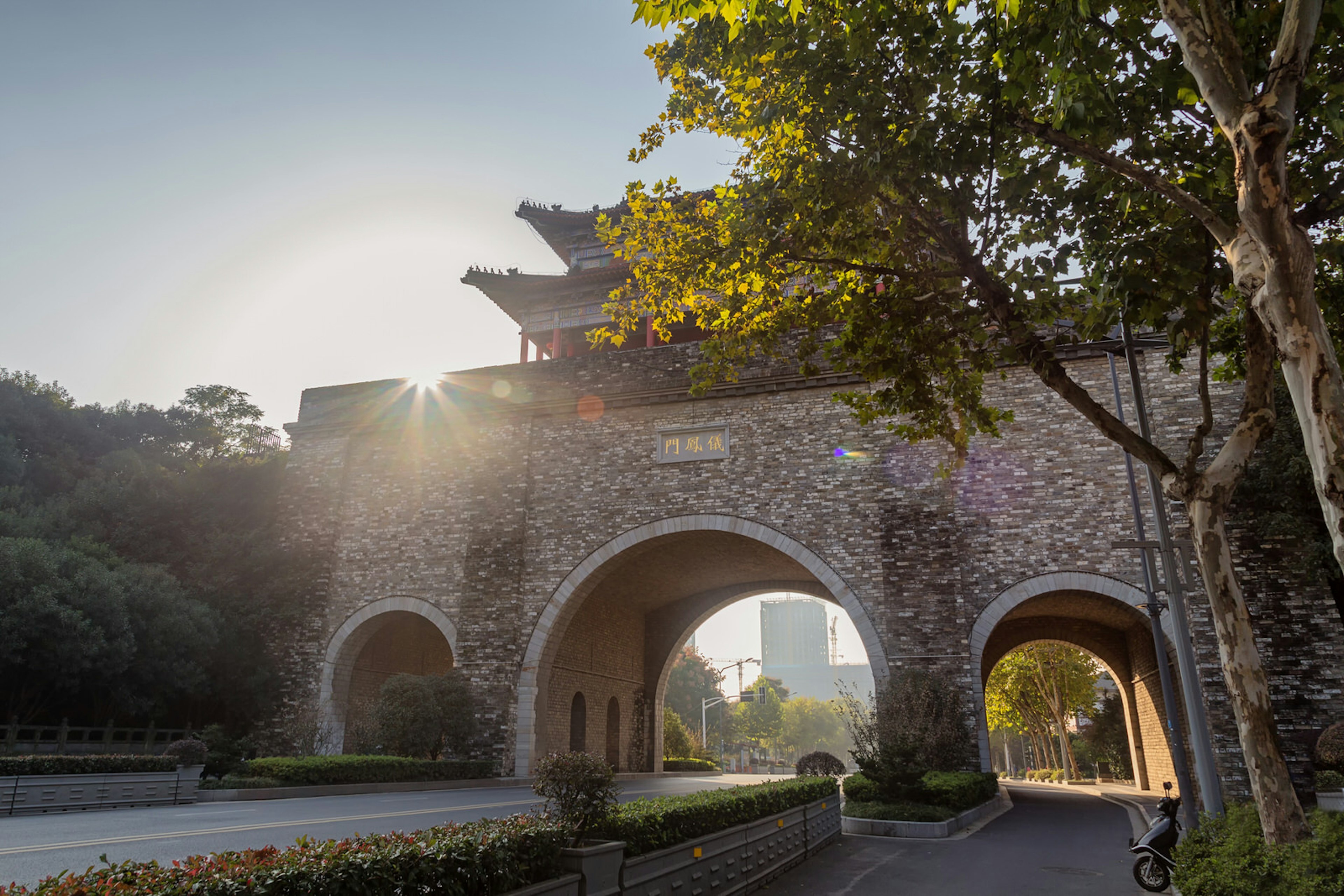 Sun shining over Yijiang Gate along Nanjing's wall ? Sino Images / Getty