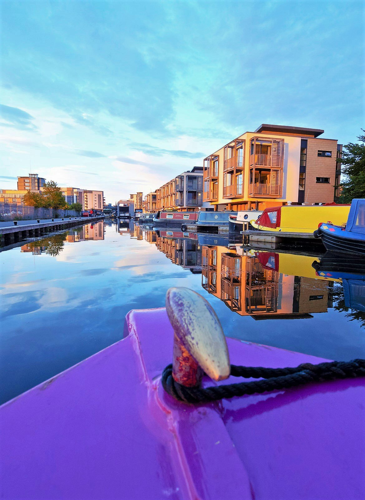 A boat in the water at Edinburgh Quay on the Union Canal.