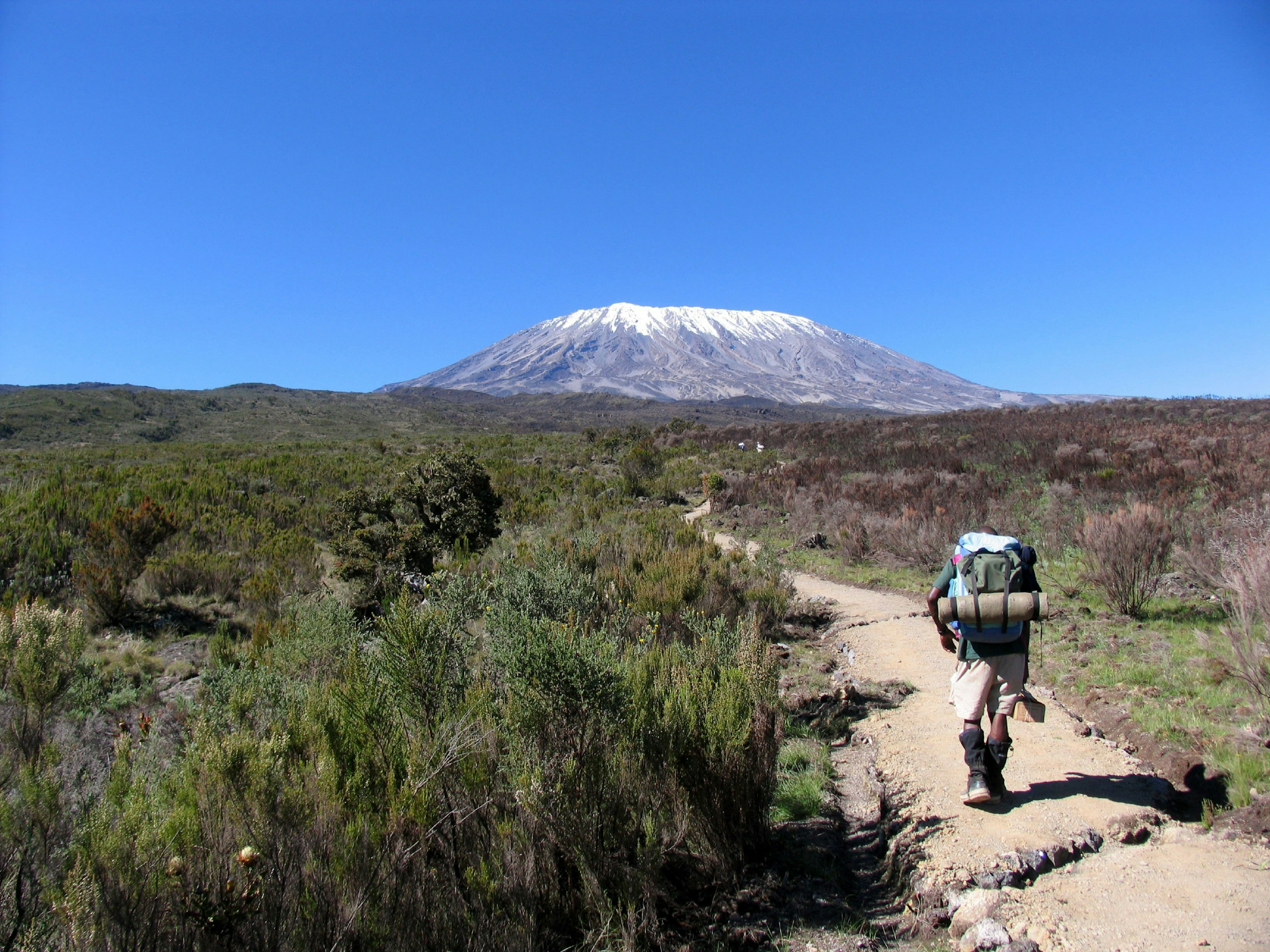 Guide walking towards a mountain.jpg