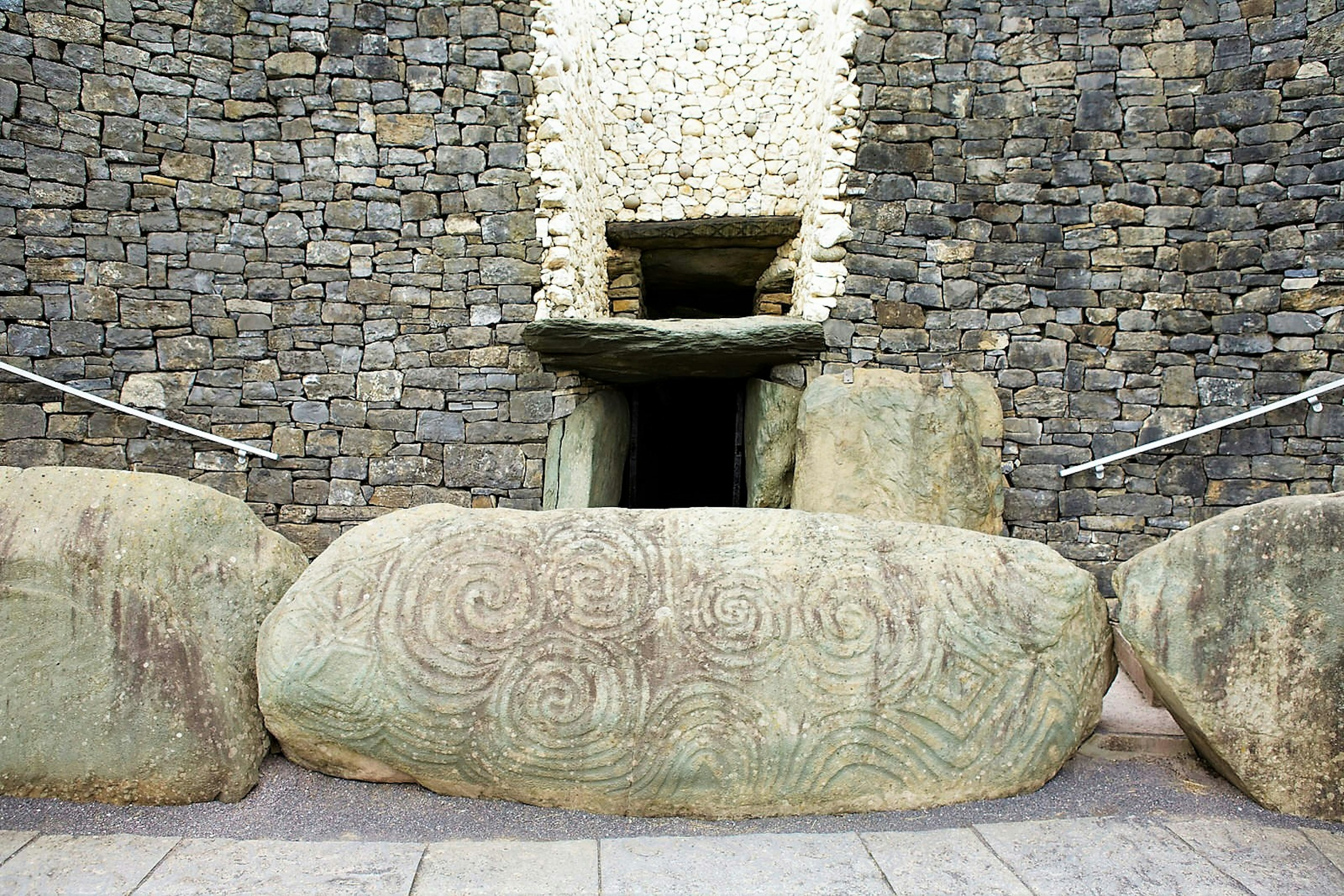 Giant stones mark the entrance to Newgrange in Brú Na Bóinne ancient site in Meath, Ireland.