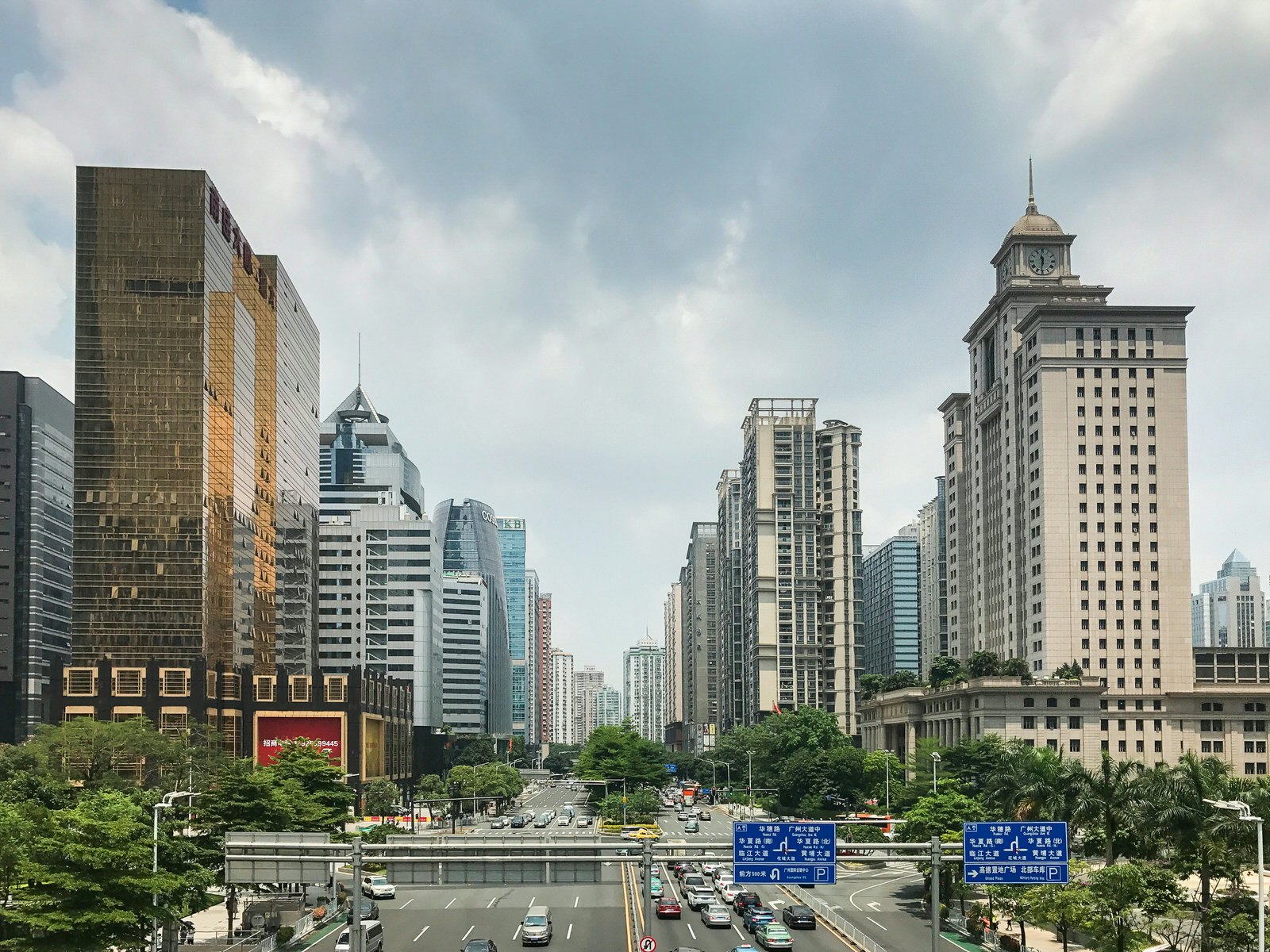 View of skyscrapers and a multi-lane road from an overhead bridge. Ultra-modern Zhujiang New Town is home to the Canton Tower © Cathy Adams / Lonely Planet